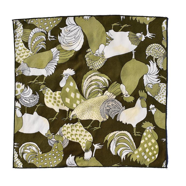A beautiful set of six green and white cloth dinner napkins. These beauties would be a wonderful way to add a pop of whimsy to any dinner table. (Or brunch!) 

Figural hens and birds with geometric patterns and floral accents.
