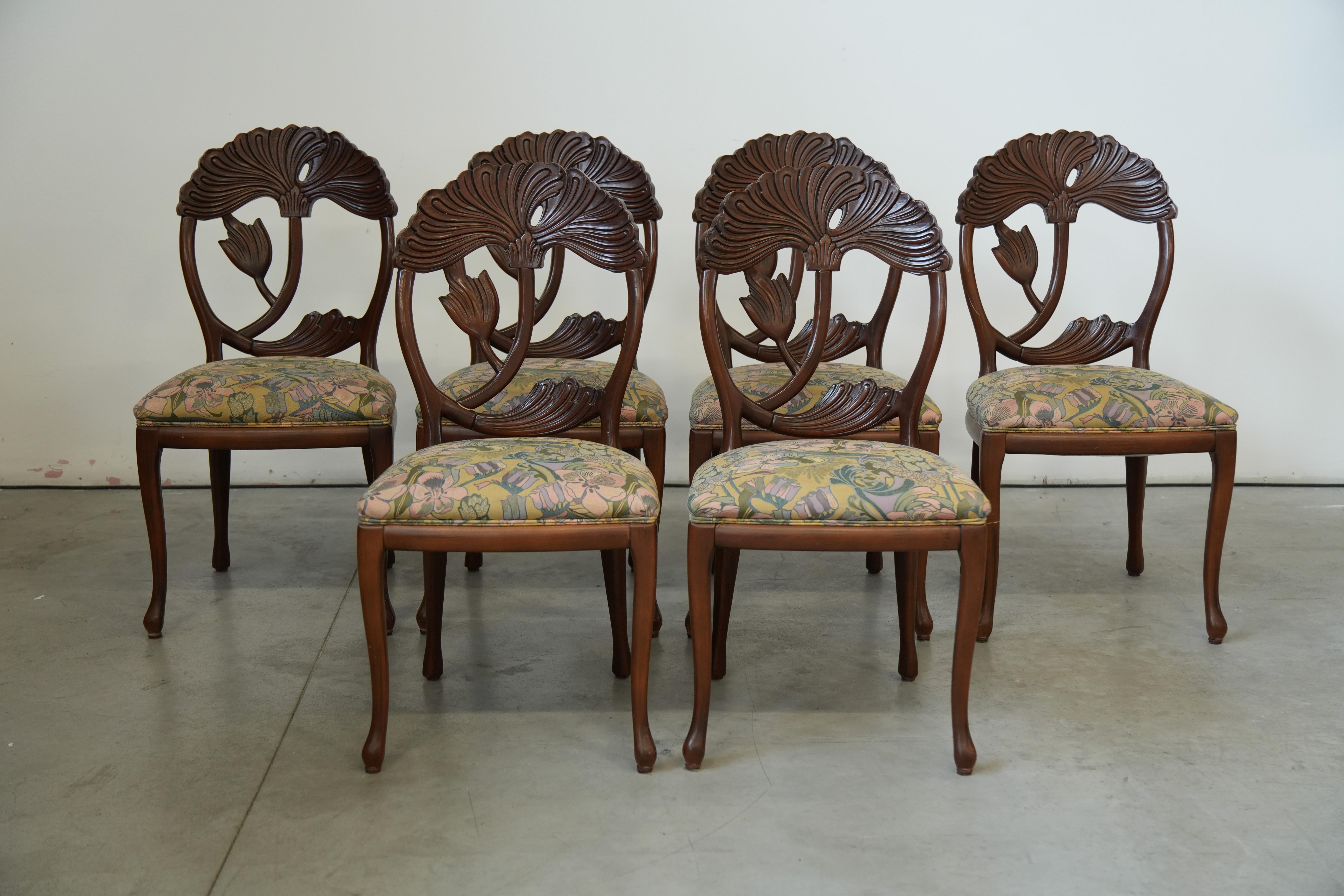Immerse your dining room in unparalleled elegance with this set of six chairs, crafted in the 1990s–2000s as a stunning organic, sculptural interpretation of Art Nouveau. Each seat stands as a work of art destined to become the focal point of any