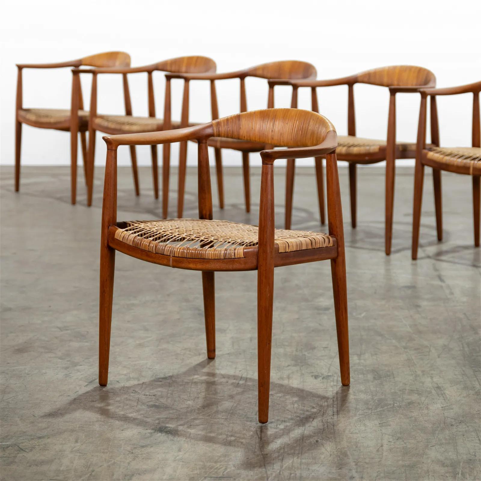 Set of six Model JH 501 dining chairs with cane seats, designed by Hans Wegner for Johannes Hansen, Denmark. This design is known as 