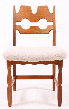 Set of 6 Henning Kjærnulf Dining Chairs in Solid Oak with Sheepskin Upholstery