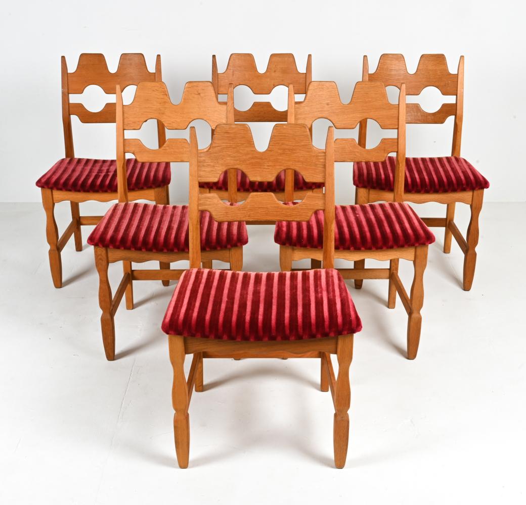 Henning Kjærnulf's iconic Razorblade Dining Chairs are celebrated for their striking and unique design. The backrests, reminiscent of finely honed razorblades, are a bold and sculptural statement that adds an artistic edge to any dining space.