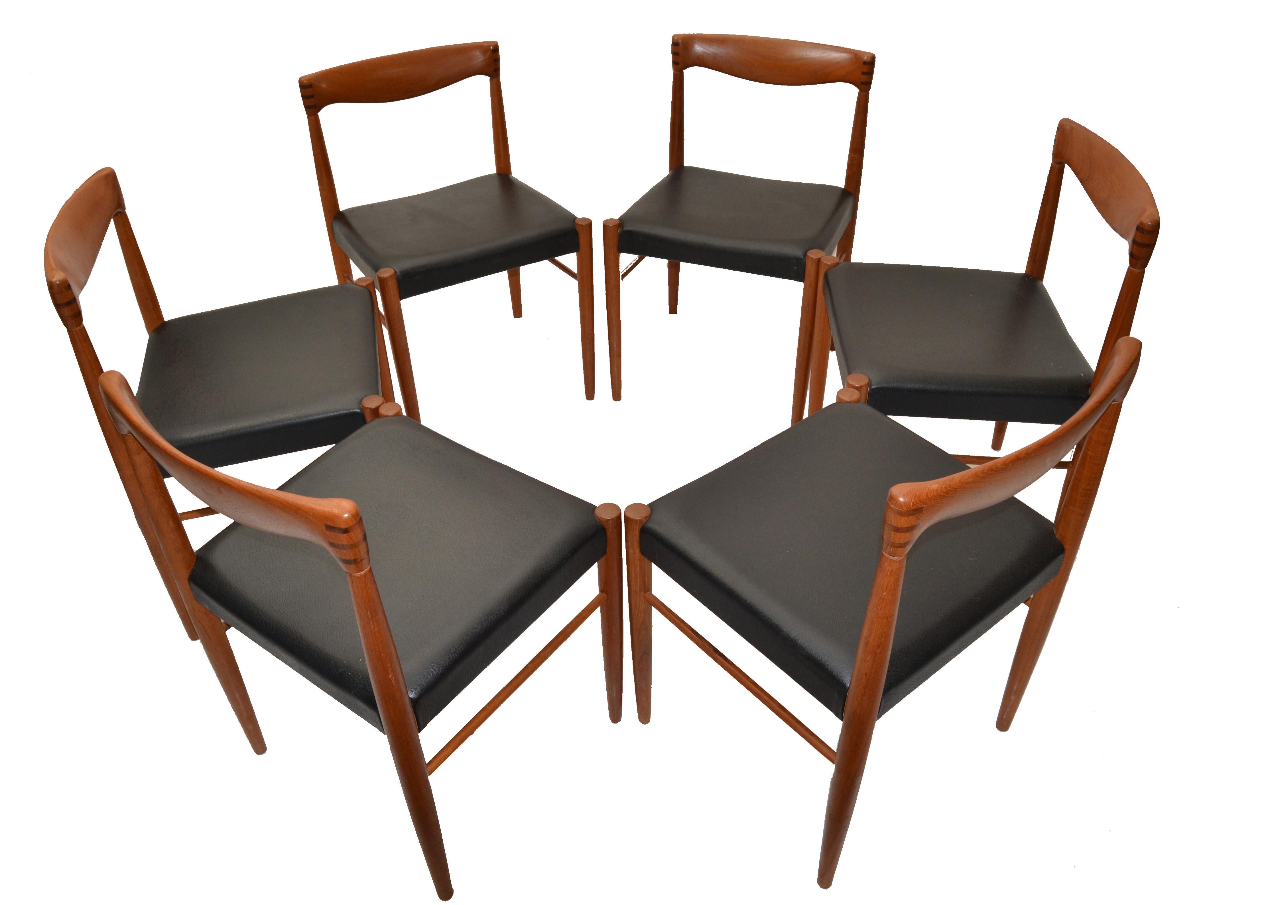 Scandinavian Modern Set of six Henry Walter Klein dining chairs in teak with rosewood inlays and black faux leather Seats.
Manufactured during the 1960 at Bramin Møbler in Denmark. Skillfully crafted in solid teak and rosewood has their own