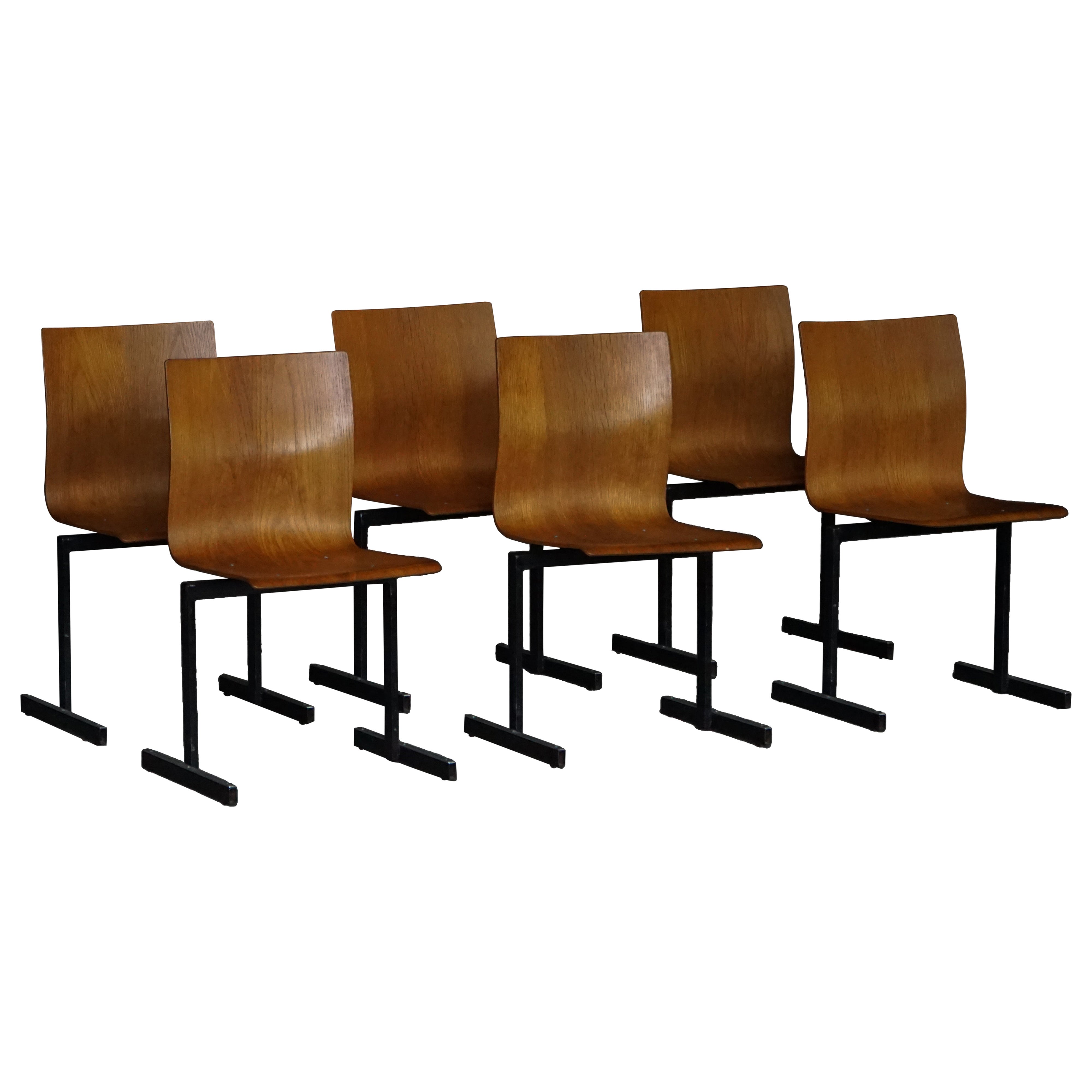 Set of 6 Industrial Stackable Chairs by Niels Larsen, Black Metal 
Oak, 1960s For Sale