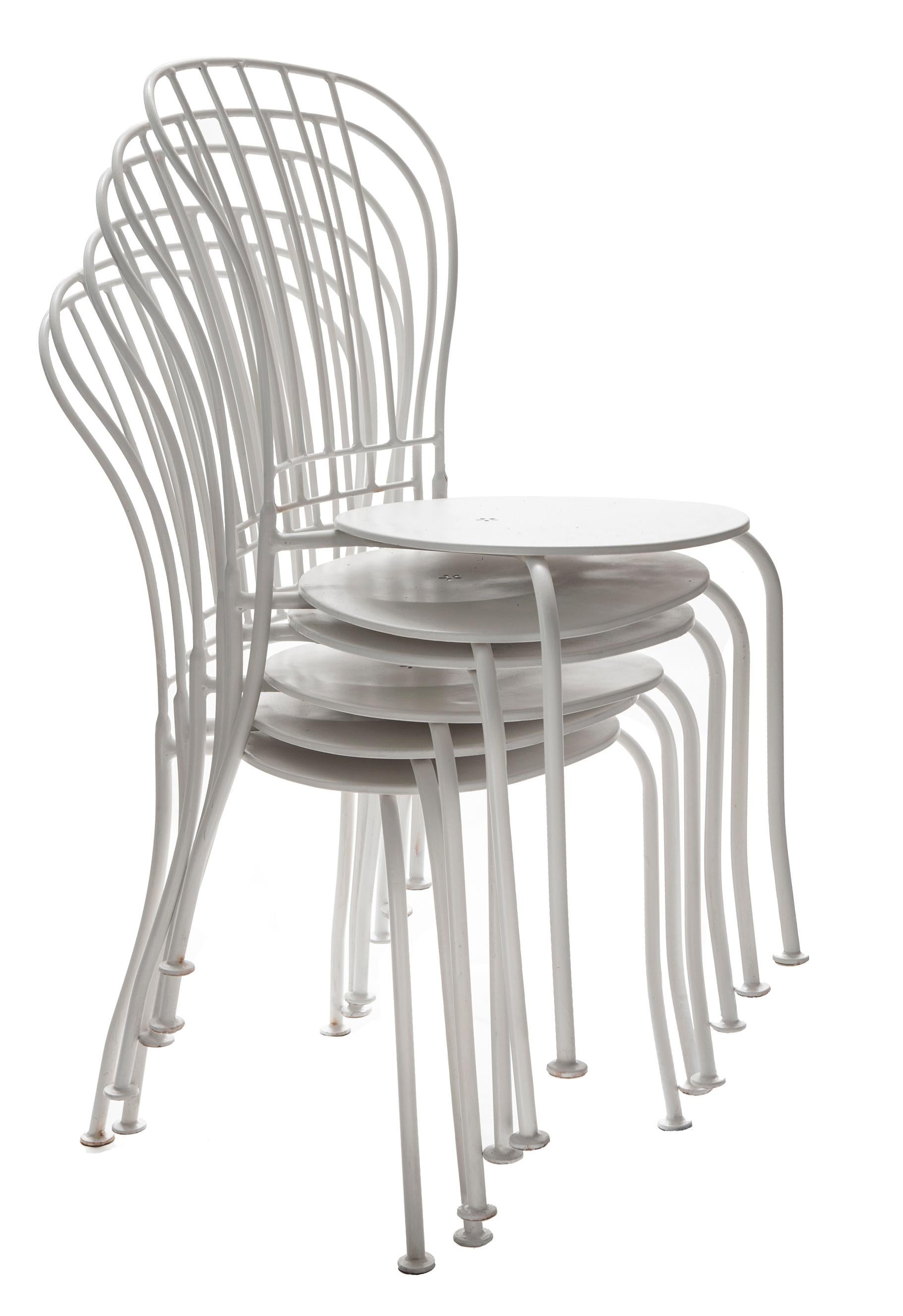 Trendy set of six stackable cafe/bistro chairs. Restored to a smooth satin white finish. The chairs stack for easy storage.