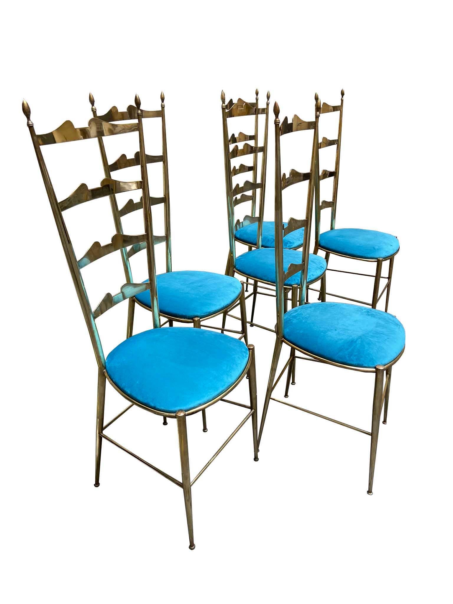 Fabulous six chairs by Chiavari designed and manufactured in 1950s period, Italy.
Brass elegant chair frame with tall ladder shape back seat and original seating covered in velvet fabric.