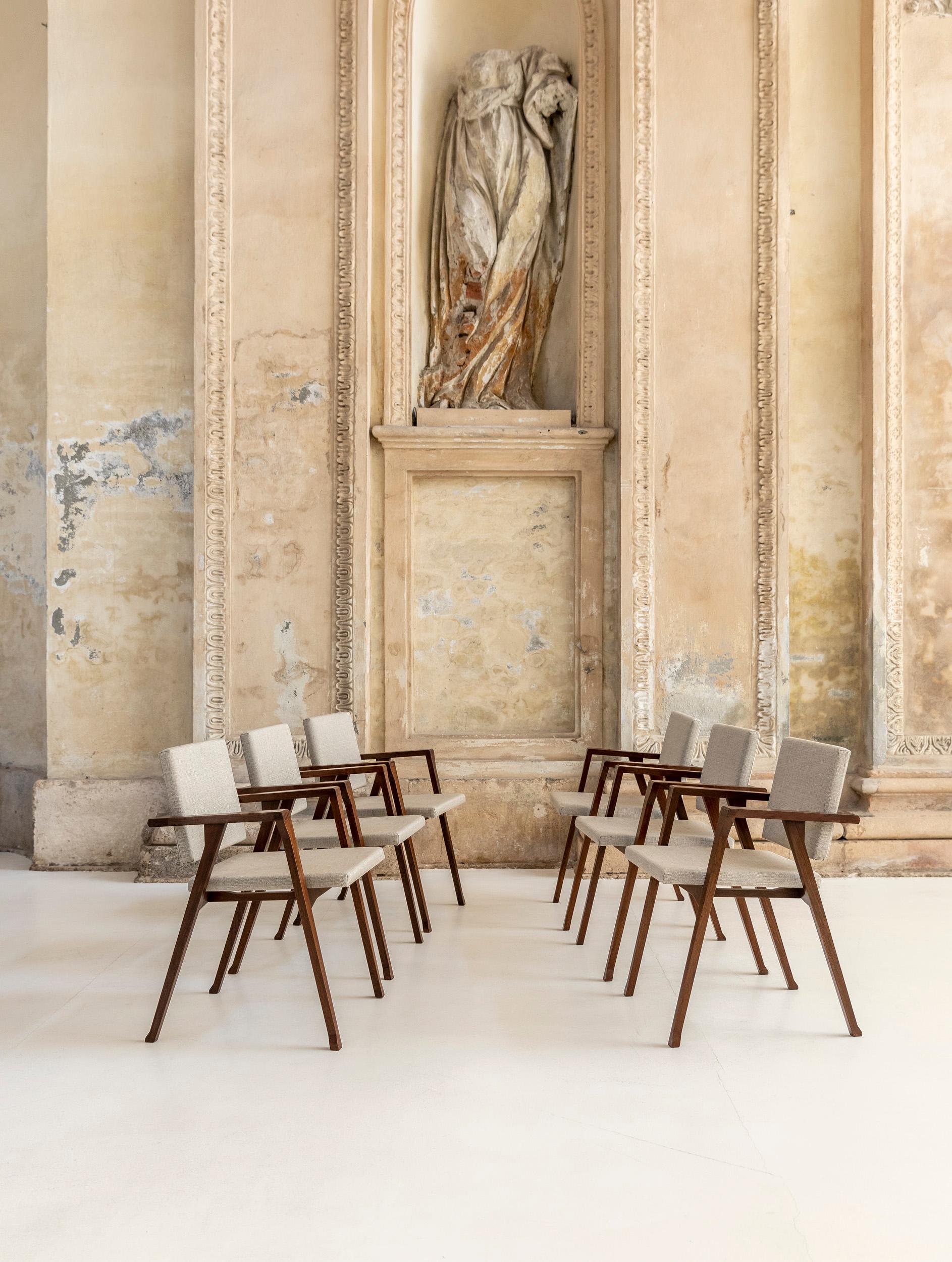Set of six Luisa chairs with a wooden structure upholstered in beige fabric, designed by Franco Albini and manufactured by Poggi Pavia, c. 1950. 
Luisa chair won the Compasso d'oro ADI in 1955.
Published.