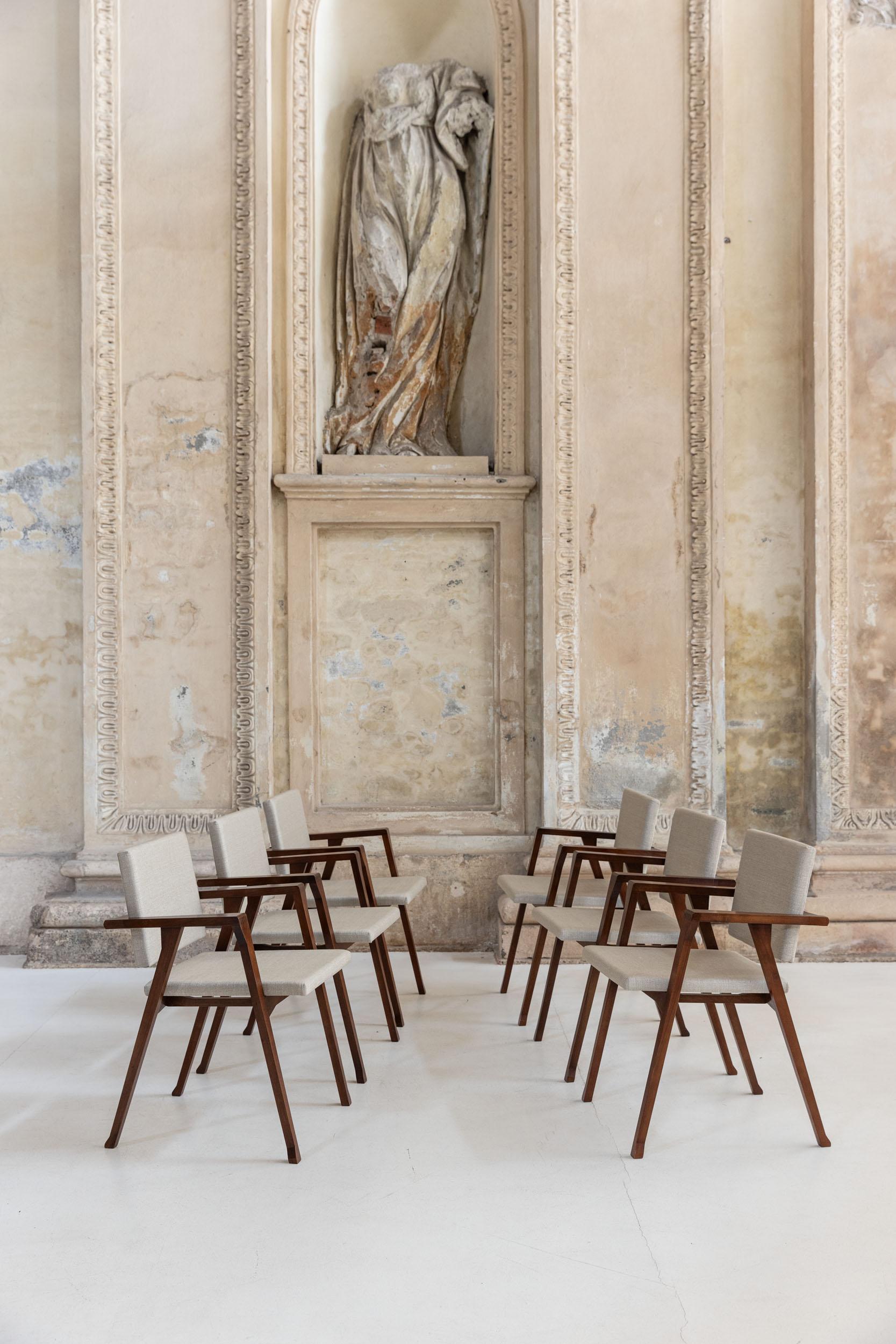 Set of six Luisa chairs with a wooden structure reupholstered in beige fabric, designed by Franco Albini and manufactured by Poggi Pavia, c. 1950. 
Luisa chair won the Compasso d'oro ADI in 1955.
Bib: Franco Albini. Metodo e Poesia, edizioni I libri