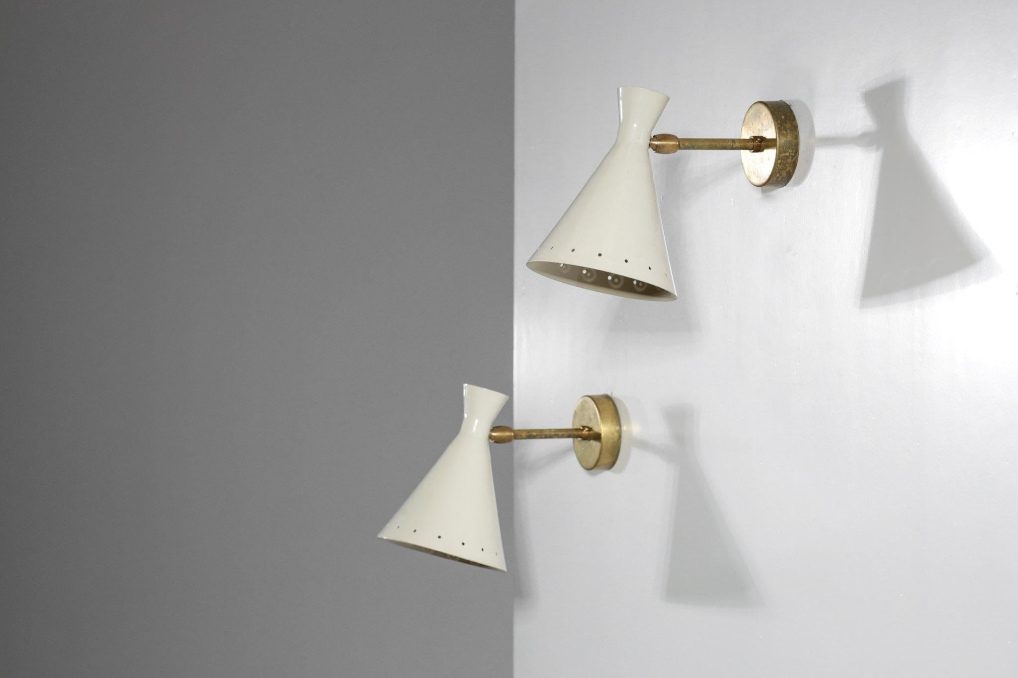 Pair of modern Italian wall lights. Also, could be used as a bedside sconces. Made with brass and painted sheet metal. Lampshade are adjustable and can light in different directions. Customers can choose color and finish brass.