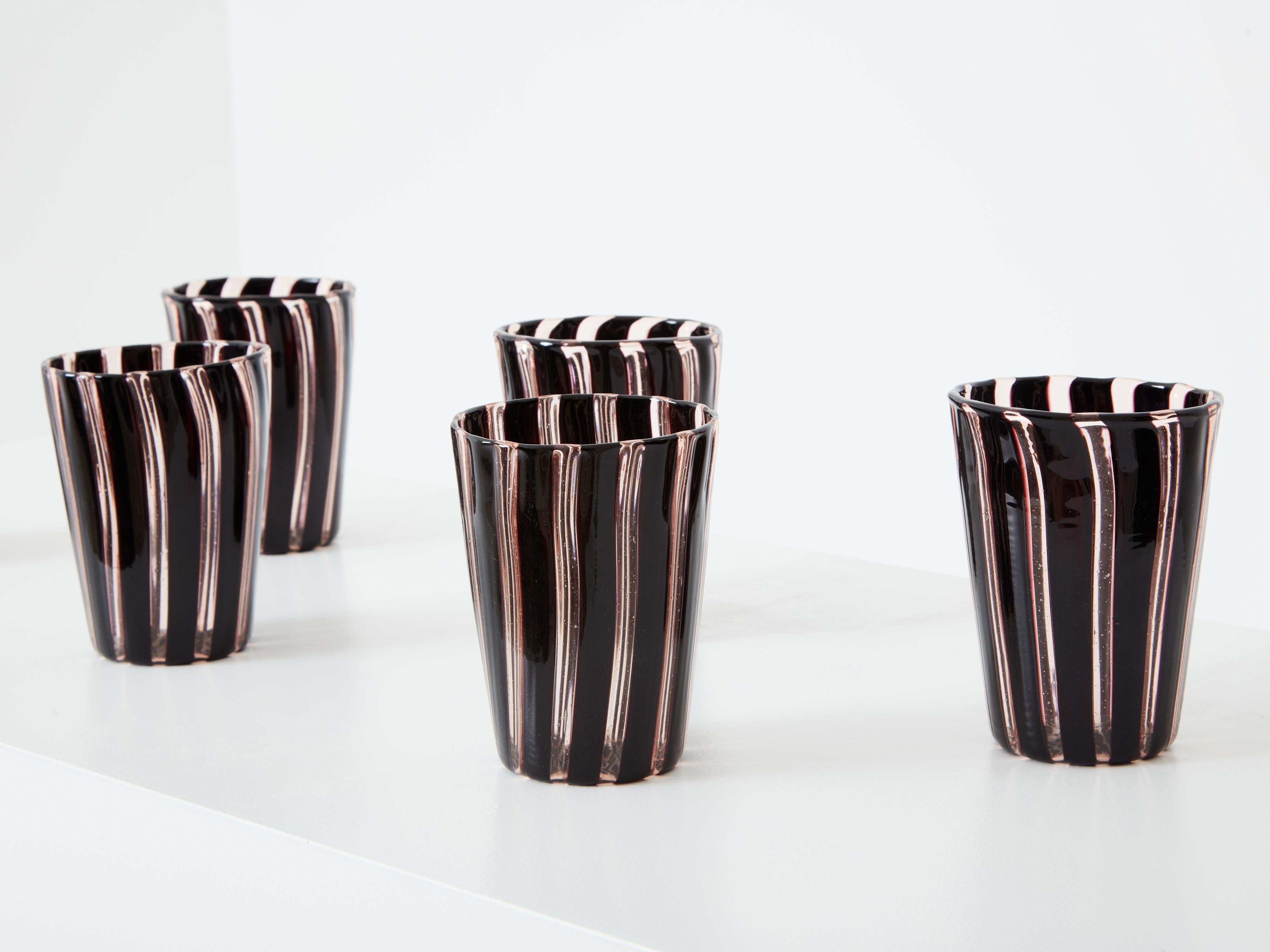 This is a beautiful set of six black and white Murano glass tumblers made in Italy in the 1980s. These are inspired by Gio Ponti and Paolo Venini tumblers “Canne” models from the Morandiana series. This beautiful set of murano pieces has