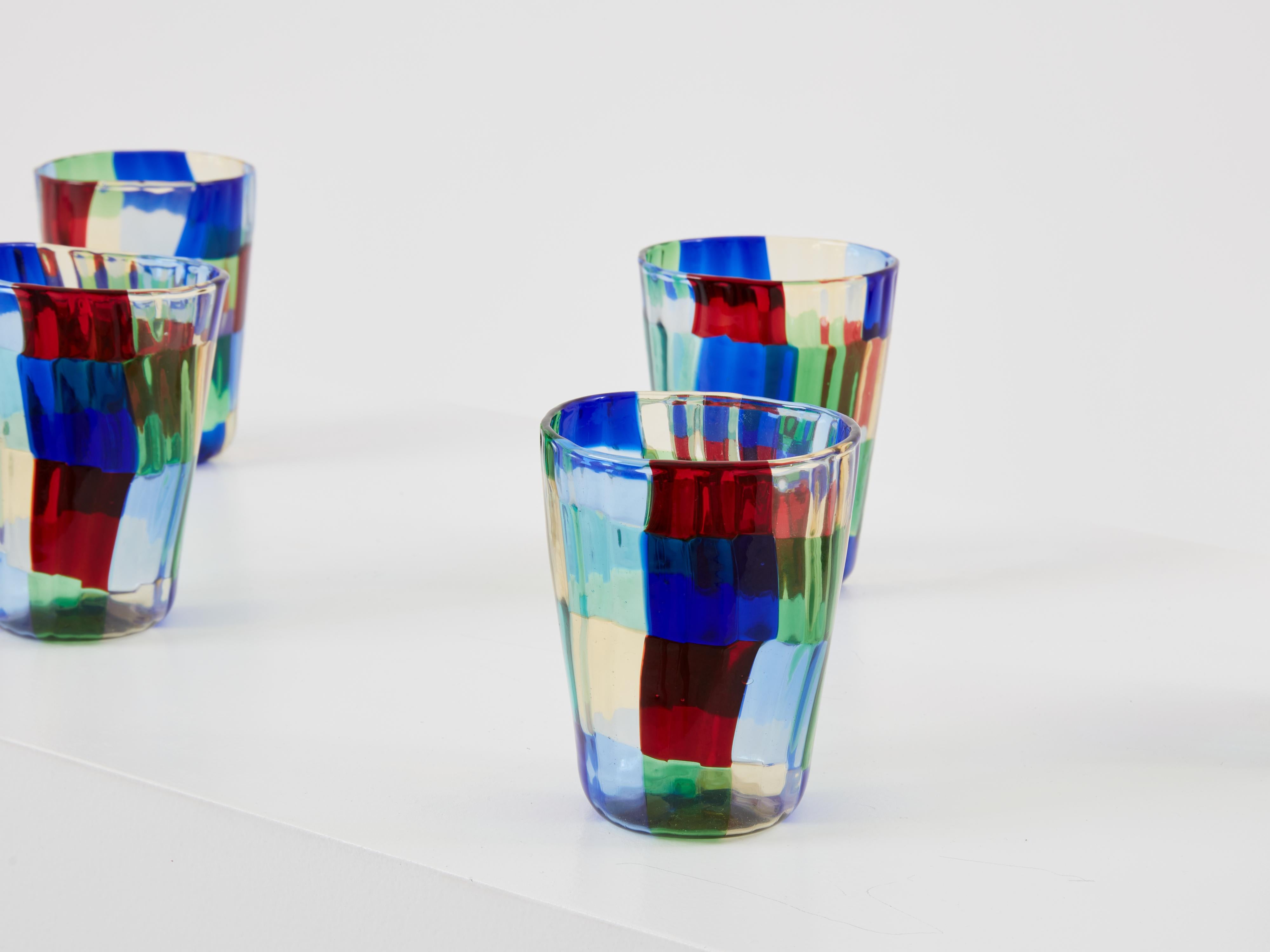 This is a beautiful set of six colorful Murano glass tumblers made in Italy in the 1980s. These are inspired by Fulvio Bianconi and Paolo Venini tumblers “Pezzato” models from the Parigi serie. This beautiful set of murano pieces has eye-catching