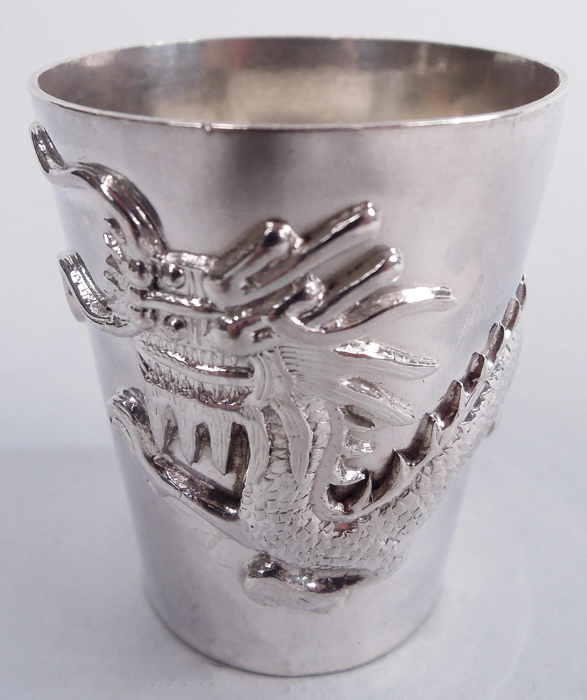 Set of 6 Japanese silver shot glasses. Each: Straight and tapering sides; applied horned and taloned dragon. For the strong stuff. Unmarked. Total weight: 5 troy ounces. 
