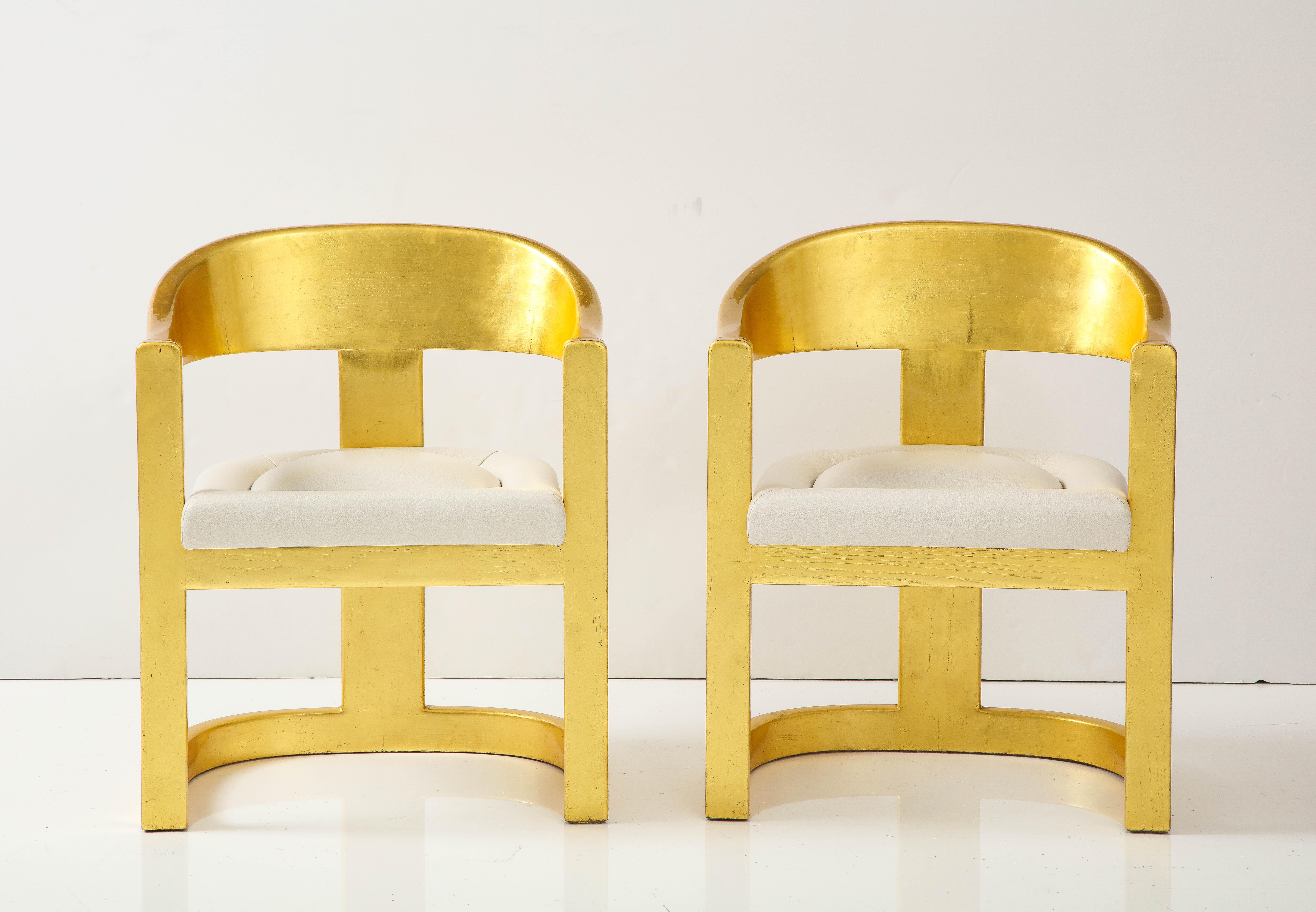 Set of 6 Karl Springer Onassis chairs with leather upholstery.
The Iconic Onassis chair is one of Karl Springers most famous designs and the beautiful lines contour to 
the body perfectly. The 6 vintage gold finished chairs have age appropriate