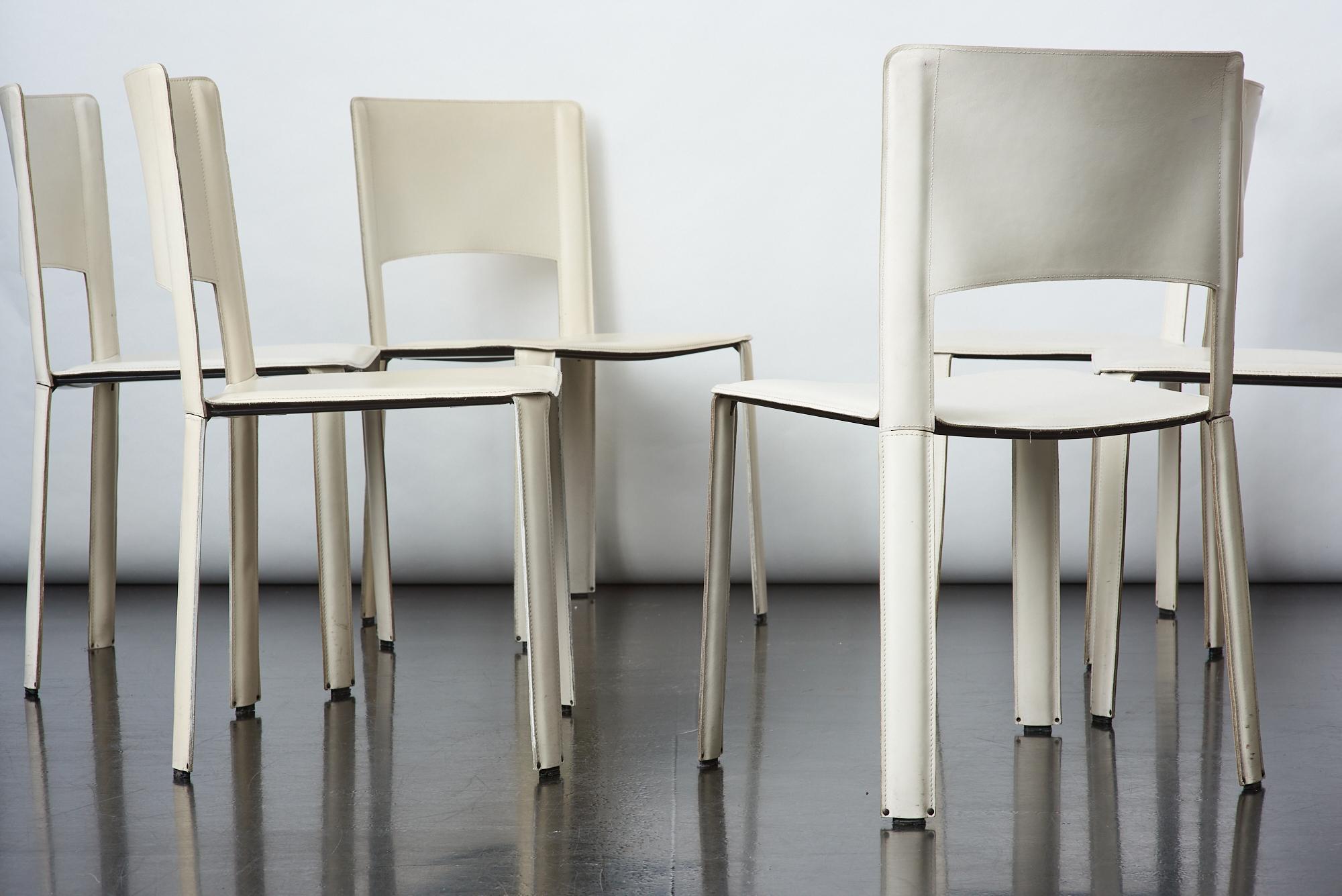Set of 6 slim beige leather dining chairs manufactured by Cidue, made in Italy.
Slim form and elegant colour!
Very good condition!