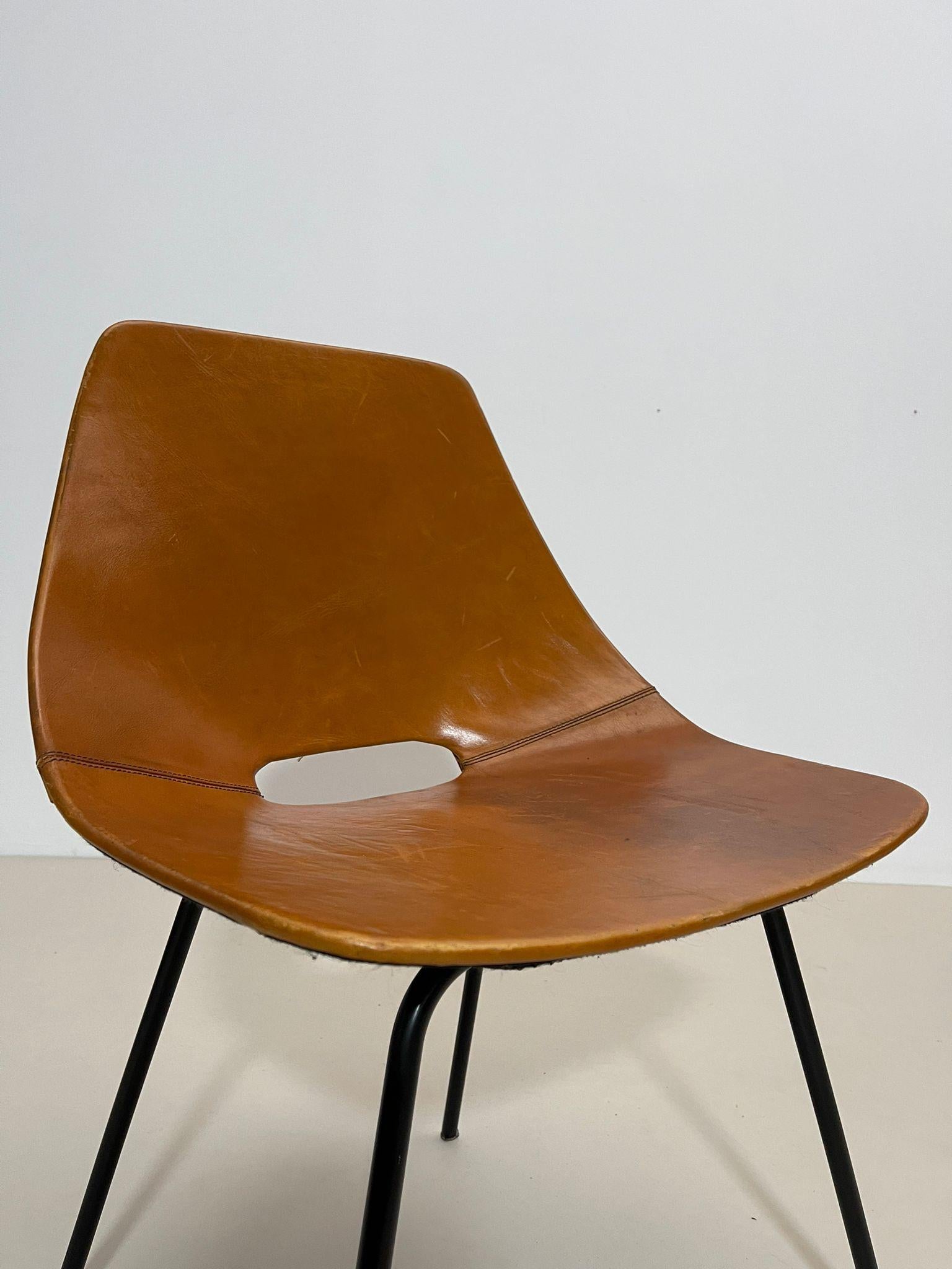 Set of 6 leather Tonneau chairs by Pierre Guariche, 1950s.