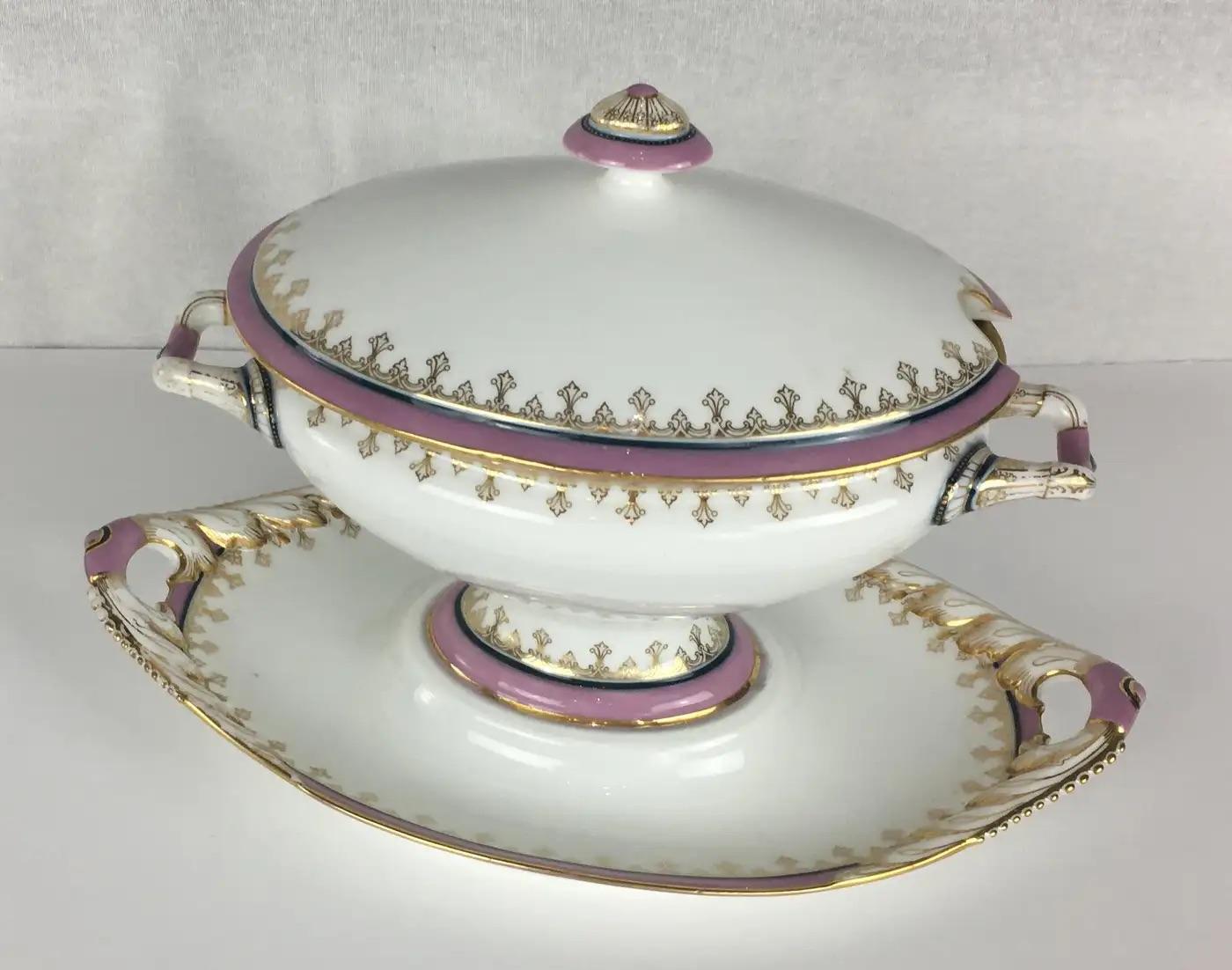 Fine antique set of 6 Limoges porcelain serving dishes. This set of serving dishes consists of two large platters, one serving dish, one cake plate, one gravy boat and one sauce bowl, all in excellent condition. 

Every item has a decorated rim with