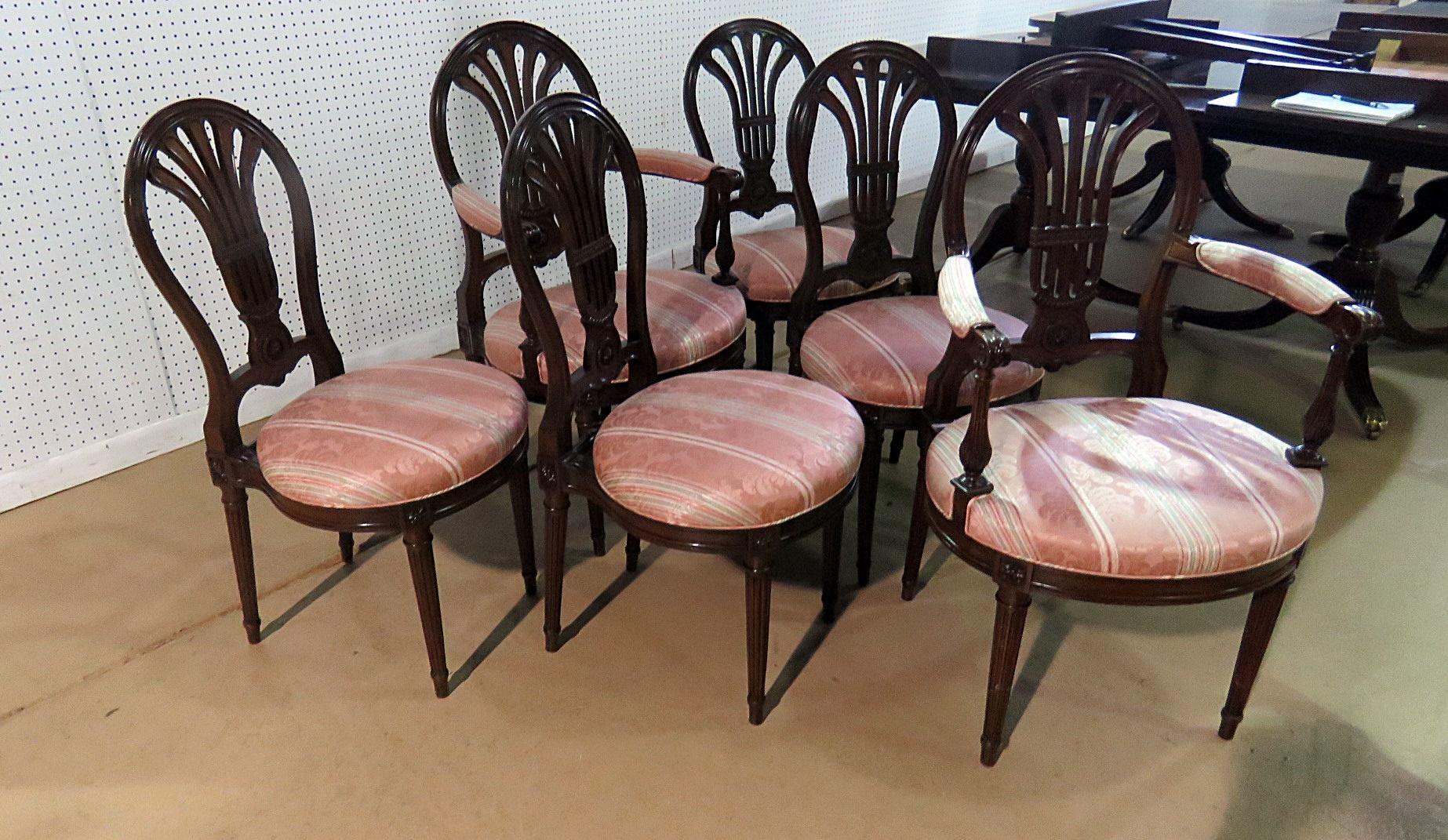 Set of 6 Louis XVI style dining chairs, attributed to Jansen. The 2 armchairs measure 39.5