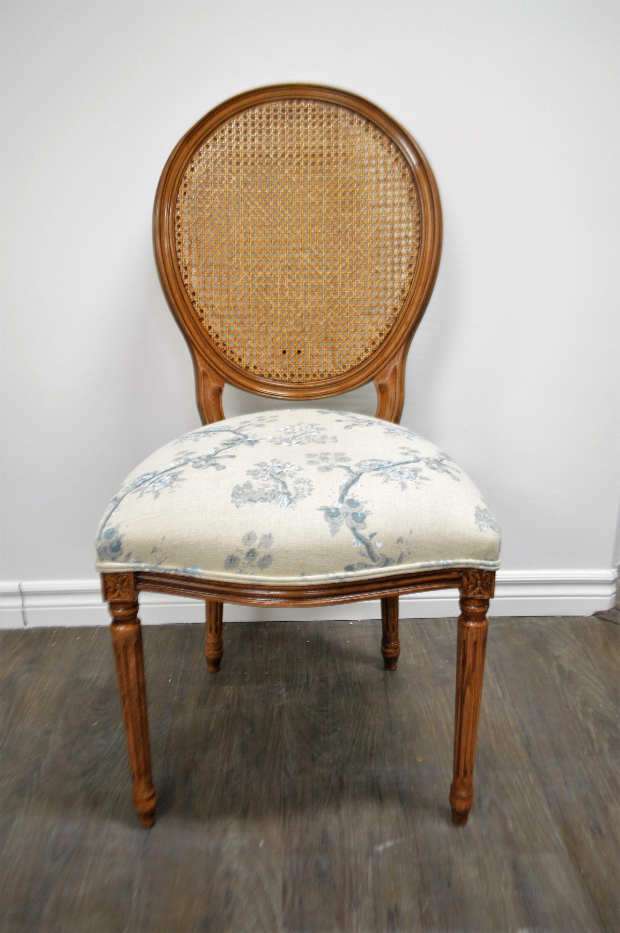 Set of 6 Louis XVI style oval back dining chairs. The chairs are made of beech wood in Italy, walnut stained.
The fabric is a silk screen print on beige linen, in tones of light and darker blue with some white.
More chairs of that style are