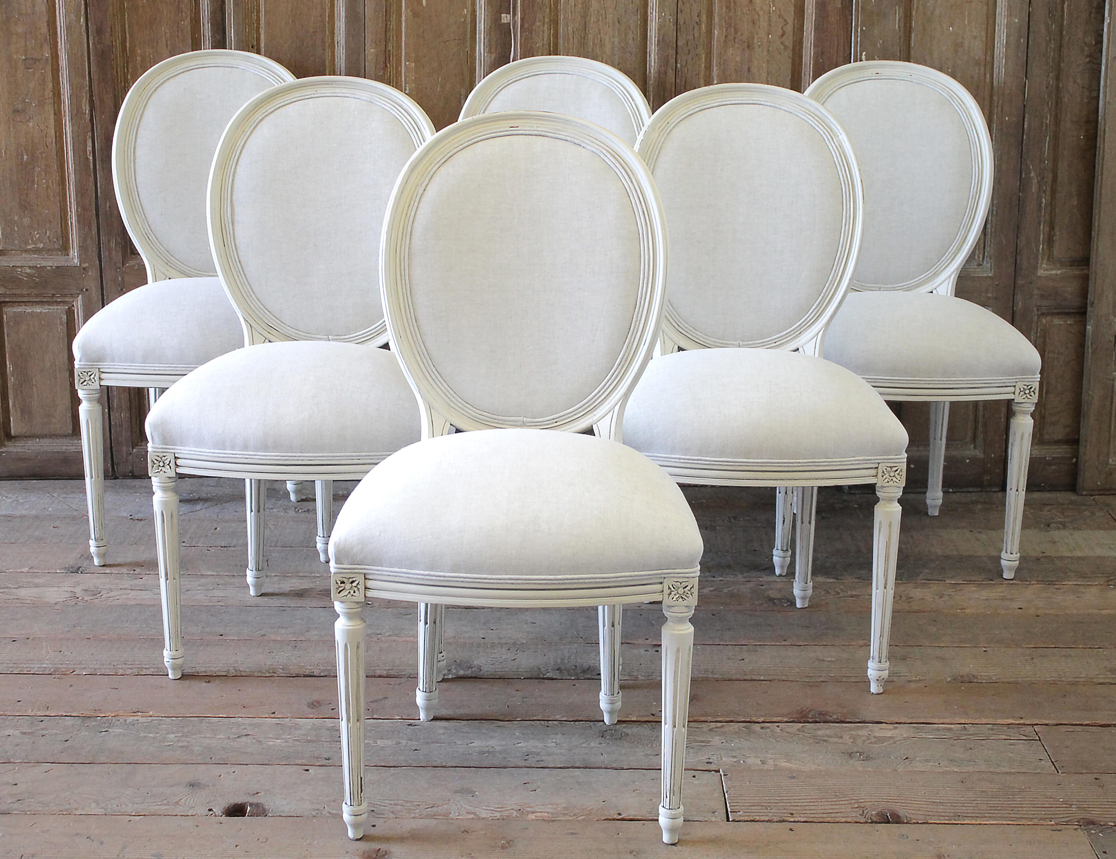 Set of 6 Louis XVI style painted and upholstered dining chairs
Painted in a soft oyster white finish, with subtle distressed edges, and finished with an antique glazed patina. These chairs are all solid and sturdy ready for daily use. Classic Louis