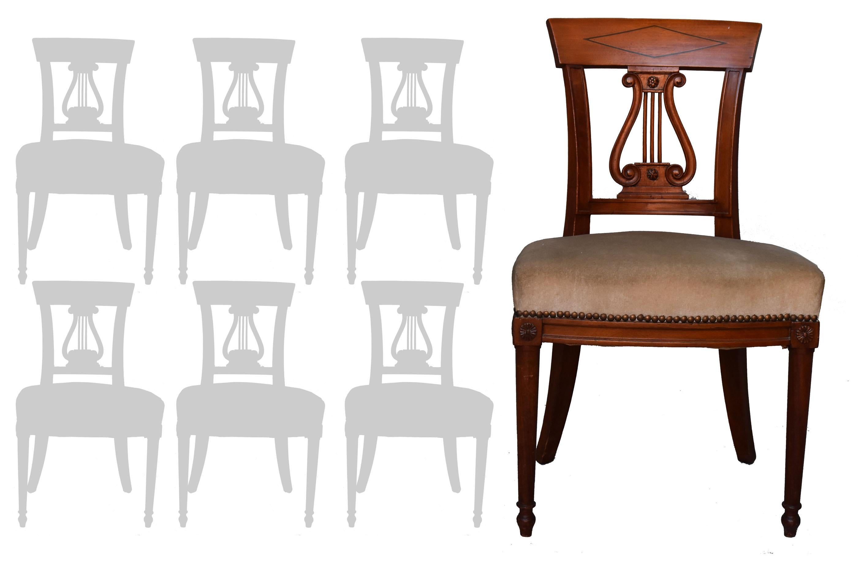 Set of 6 mahogany Restauration style chairs . Velvet top.