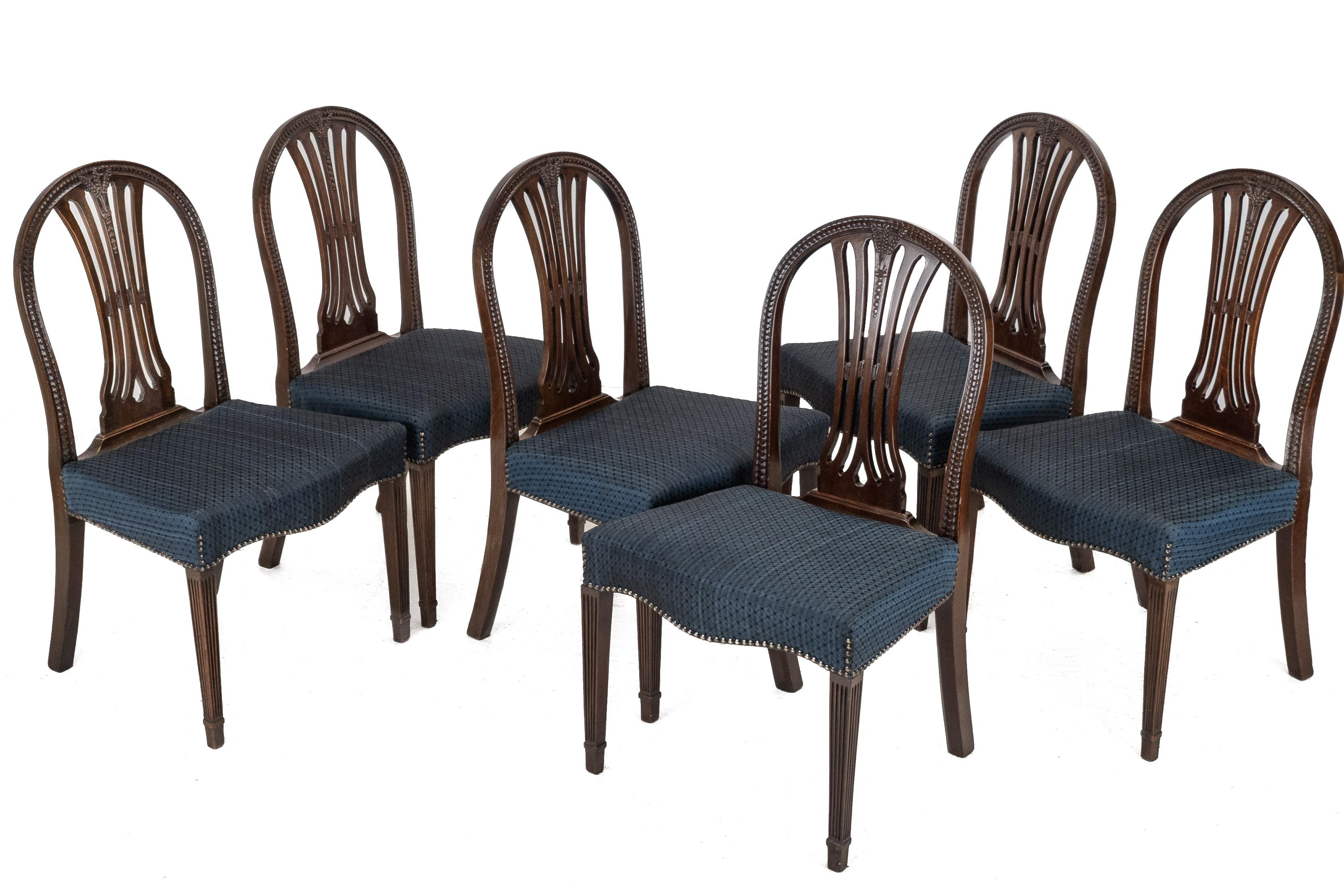Set of Six Late 19th-Century Mahogany Hepplewhite-Style Dining Chairs
A very good set of six late 19th-century mahogany dining chairs in the Hepplewhite revival style, dating to circa 1870–1885. Each chair features an elegant bowed top rail above a