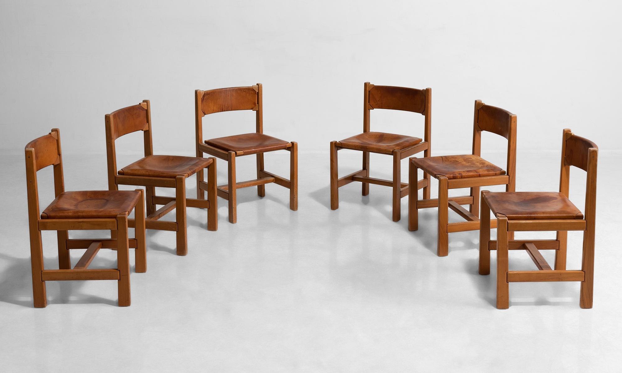 Set of (6) Maison Regain chairs, France, circa 1970.

Elm frame with original leather upholstery.