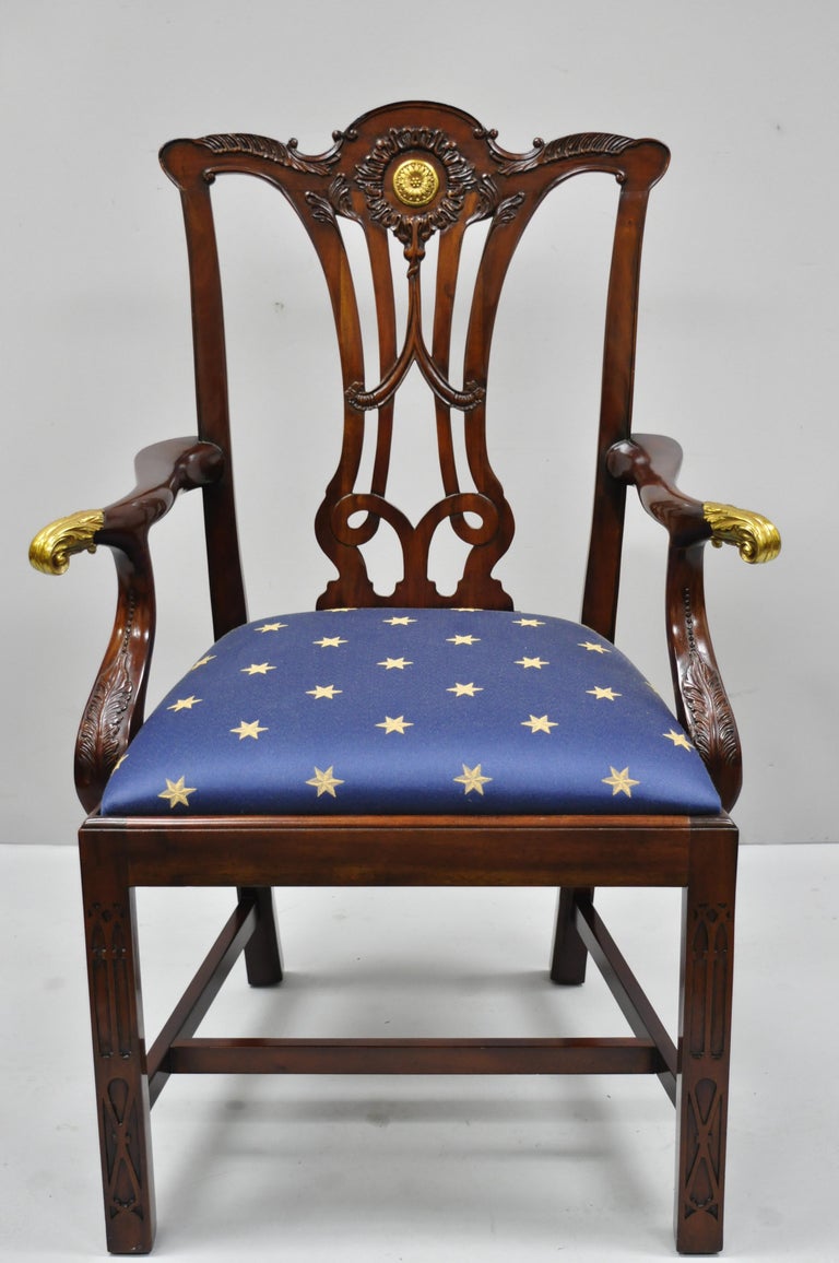 Set of 6 Maitland Smith mahogany Chippendale style dining chairs with brass ormolu. Listing includes (2) armchairs, (4) side chairs, cast brass medallions on the front and rear, ornate solid cast brass arms to armchairs, blue silk upholstered seats,