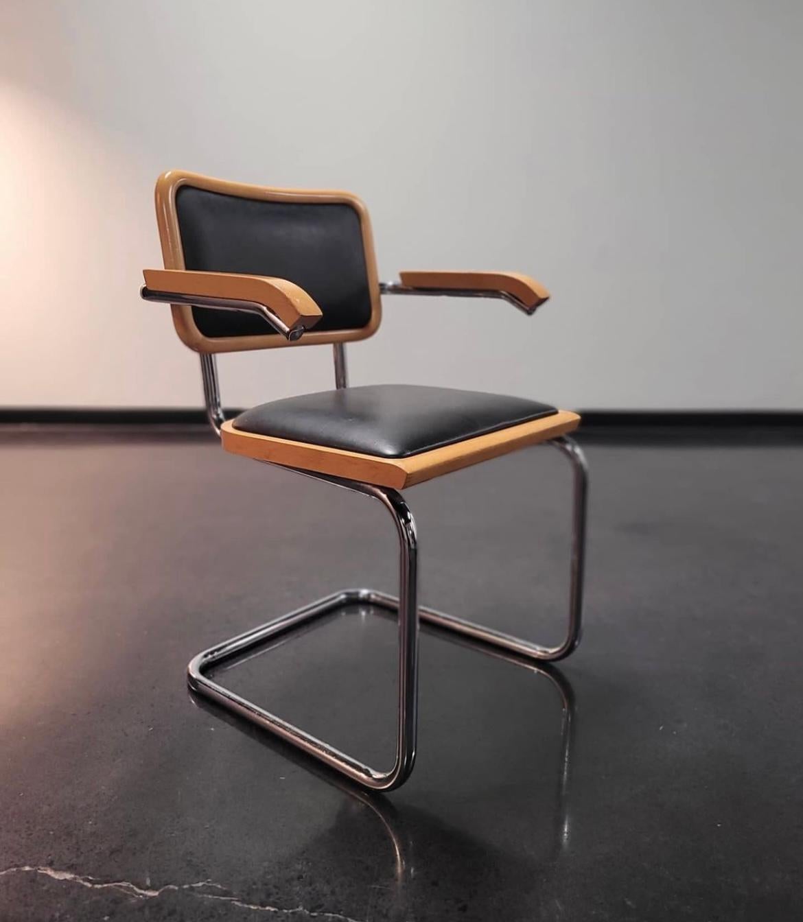 Rare set of 6 Marcel Breuer black vinyl Cesca armchairs, made in Italy. These chairs are part of the most important list from the 20th century design furniture collection. Although made in the 80s, the Cesca chair was originally designed by Marcel