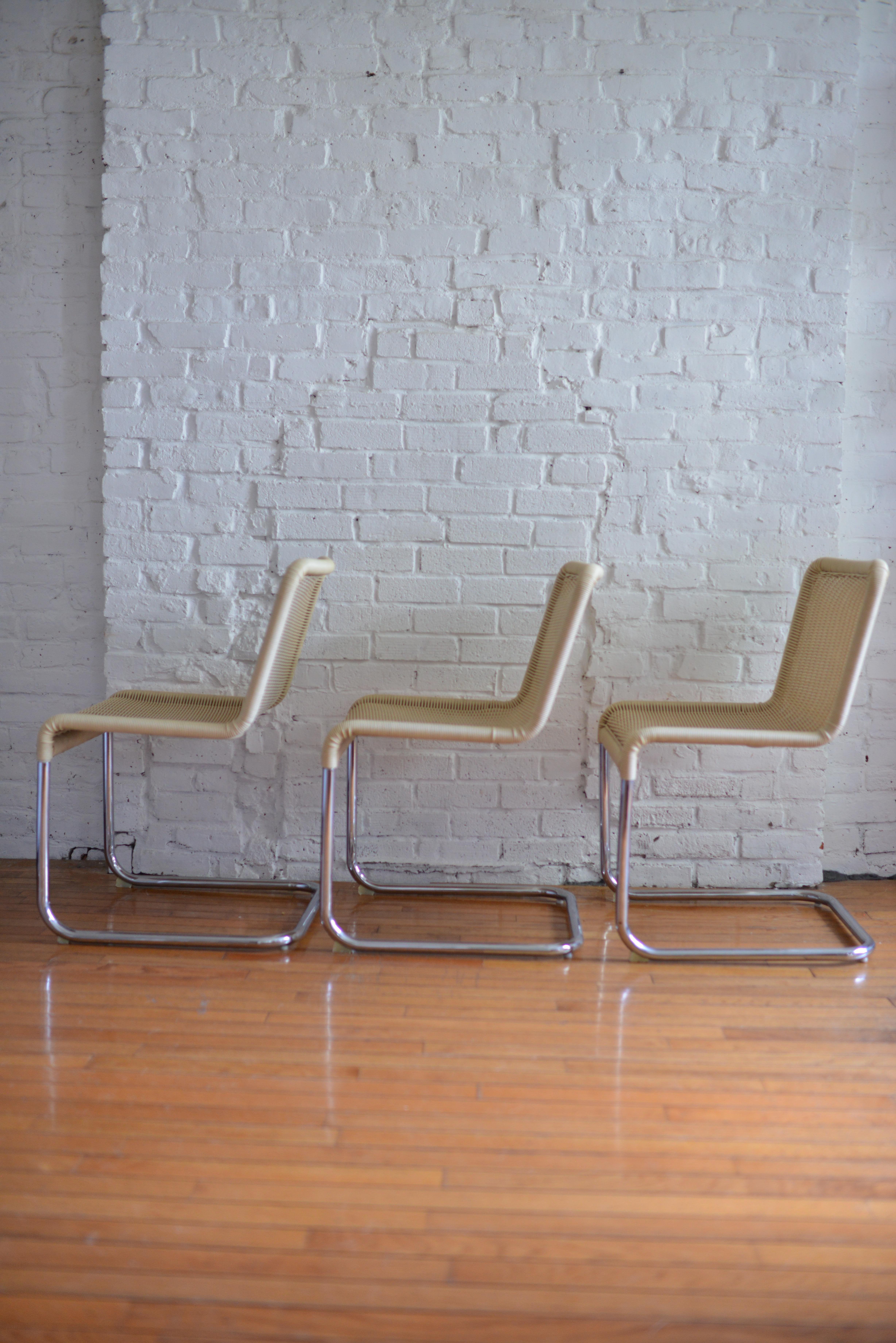 Late 20th Century Set of 6 Marcel Breuer Style Woven Acrylic Rattan and Chrome Chairs For Sale