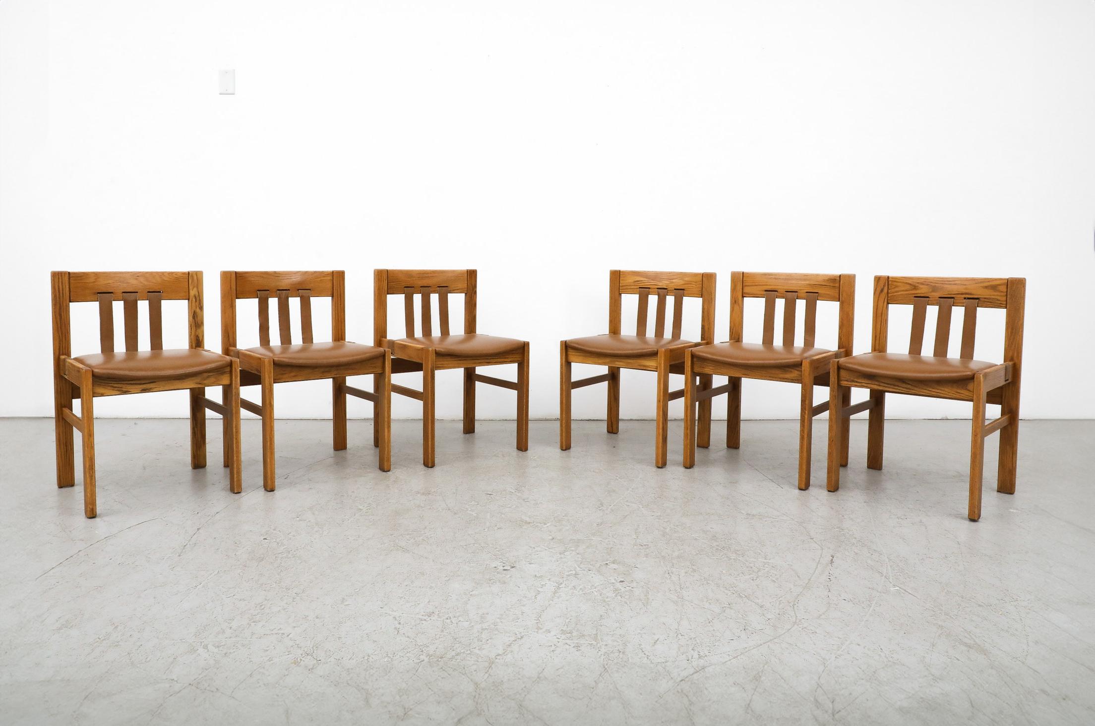 Beautiful set of 6 Mid-Century dining chairs by Martin Visser for 't Spectrum.  Highly appealing Modernist design and handsomely streamlined oak frame outfitted with leather strapping make this set truly eye-catching as well as a great example of