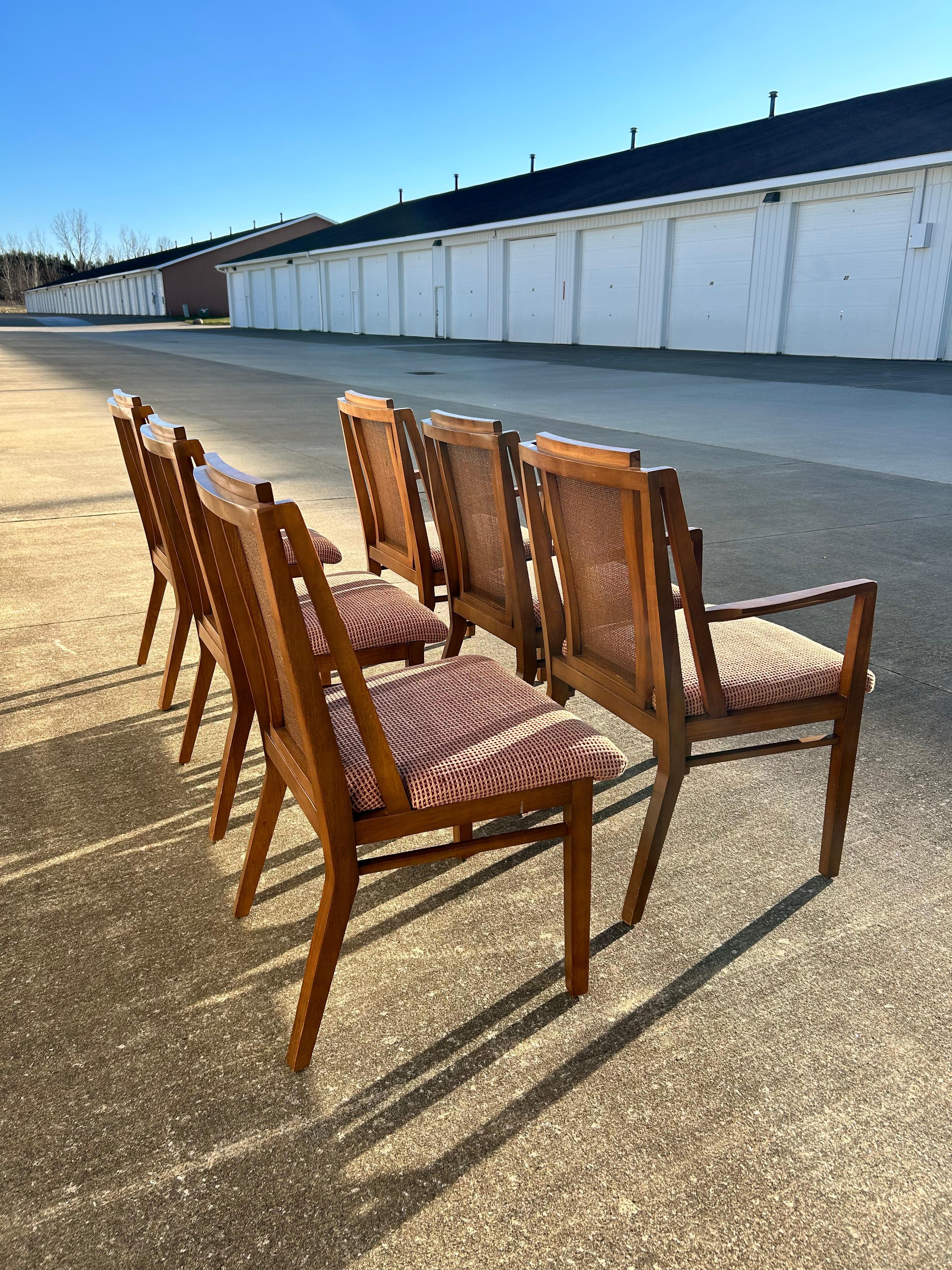 Set of (6) timeless cane back dining chairs for Drexel Heritage Furniture.  These chairs feature a walnut frame and red and gold patterned chenille fabric.  These are the perfect definition of mid-century modern dining chairs; with these chairs, you