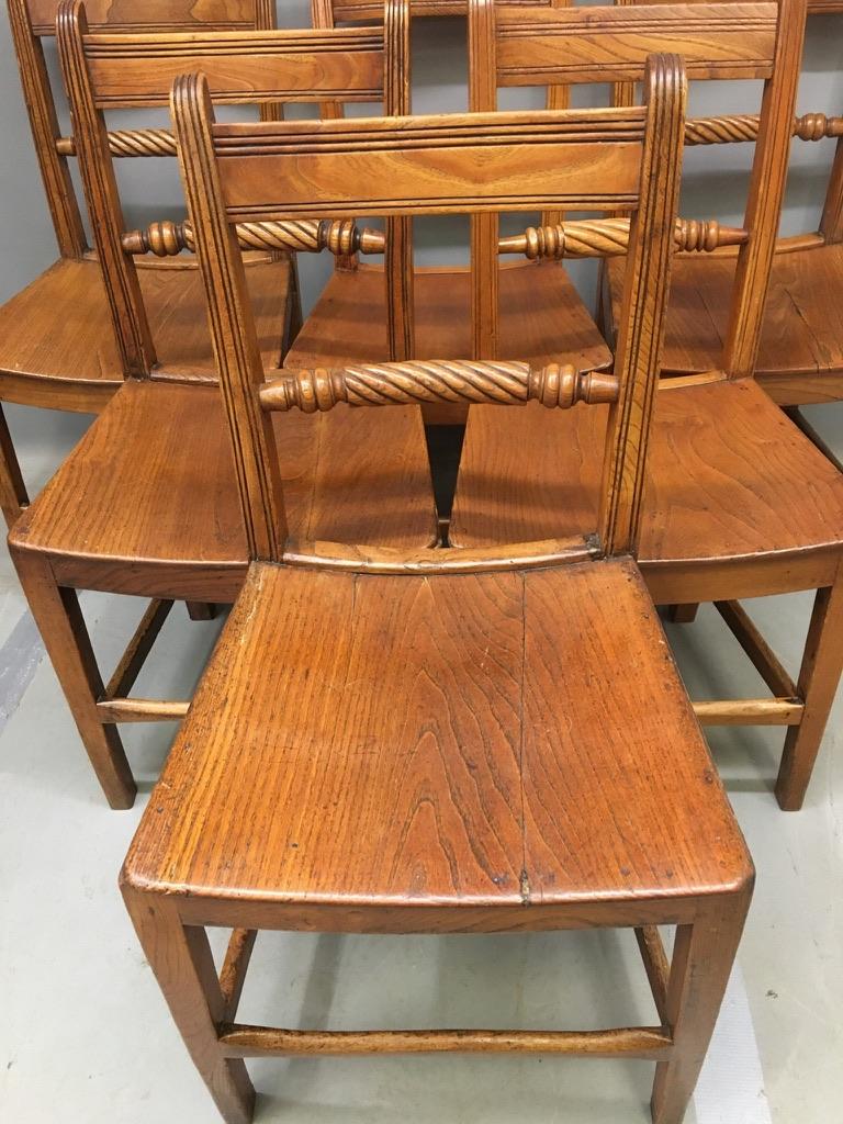 Lovely set of 6 mid-19th century English Suffolk or East Anglia chairs in solid elm.
The chairs have their Classic shaped wooden seat and with a rope spindle back and square tapering legs.
They are all in good condition and the frames are
