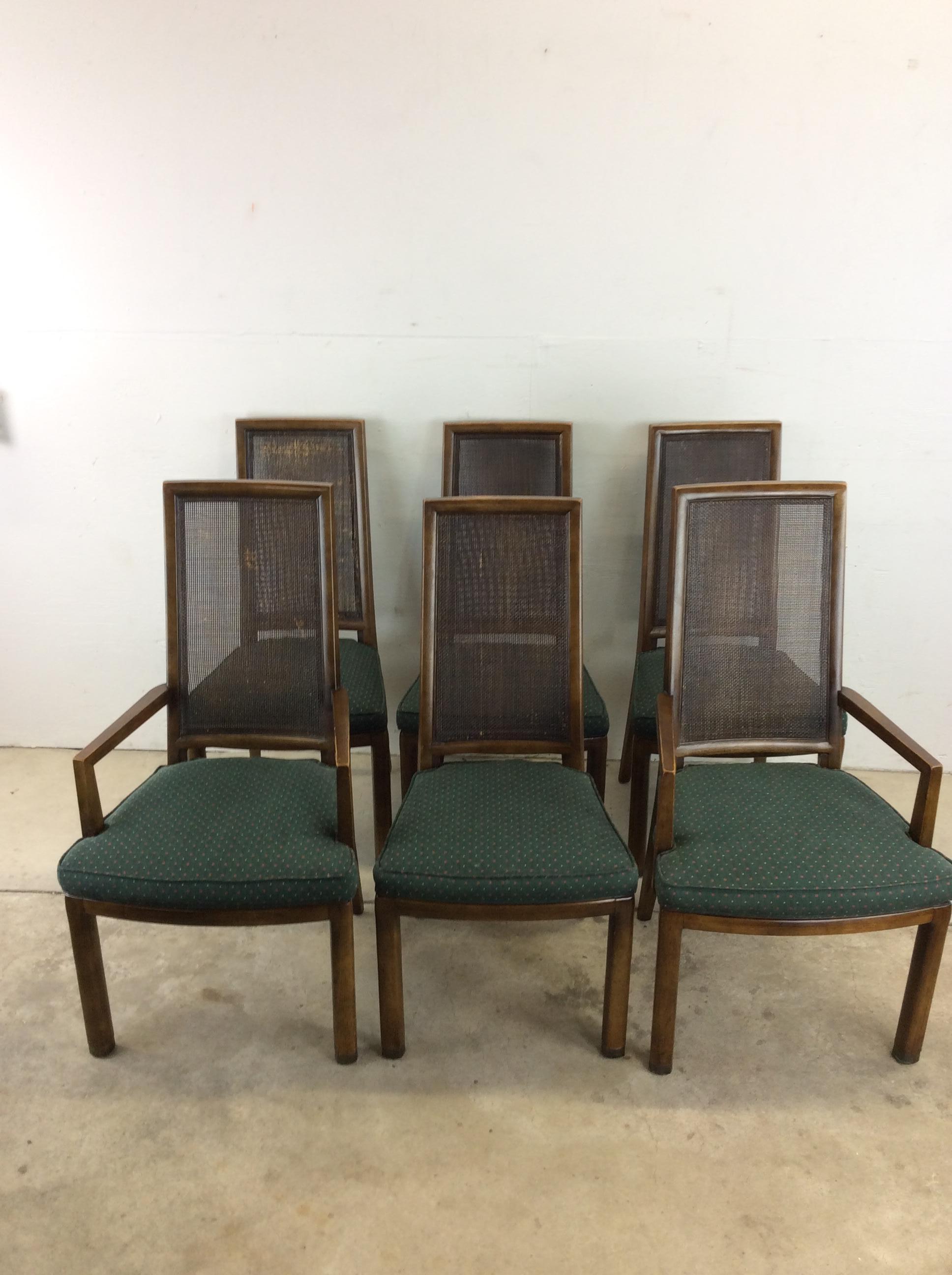 This set of 6 Mid-Century Modern dining chairs by Henredon feature hardwood construction, original dark walnut finish, caned back, vintage green upholstery, and tall tapered legs.
Dimensions: 22W 18D 41.5H 18sh 24.75AH.
 