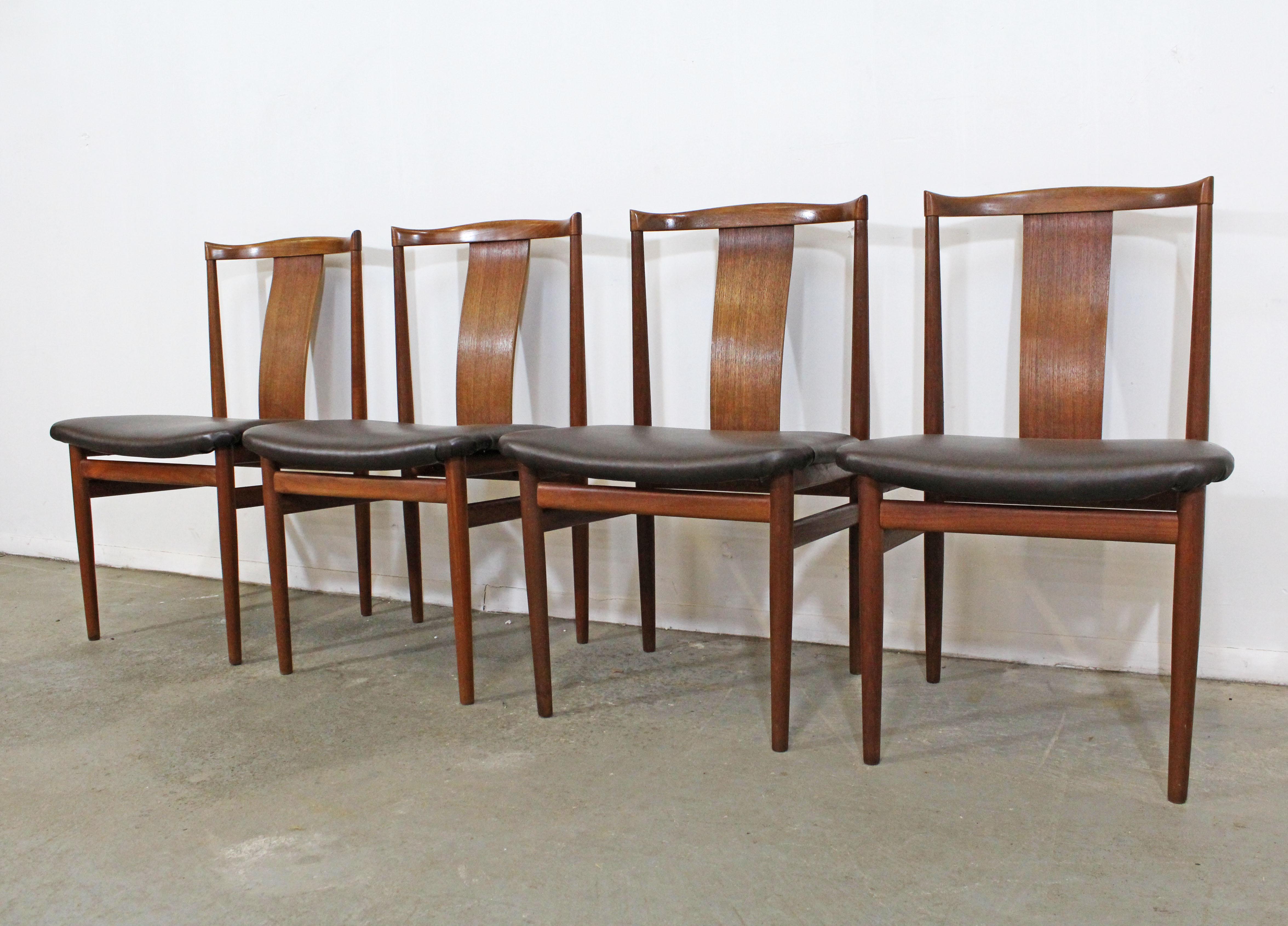 What a find. Offered is a Danish modern set of 4 teak dining chairs. This set includes 4 side chairs that are made teak with vinyl upholstery. They are in good vintage condition, showing slight age wear. They are not signed. 

Approximate