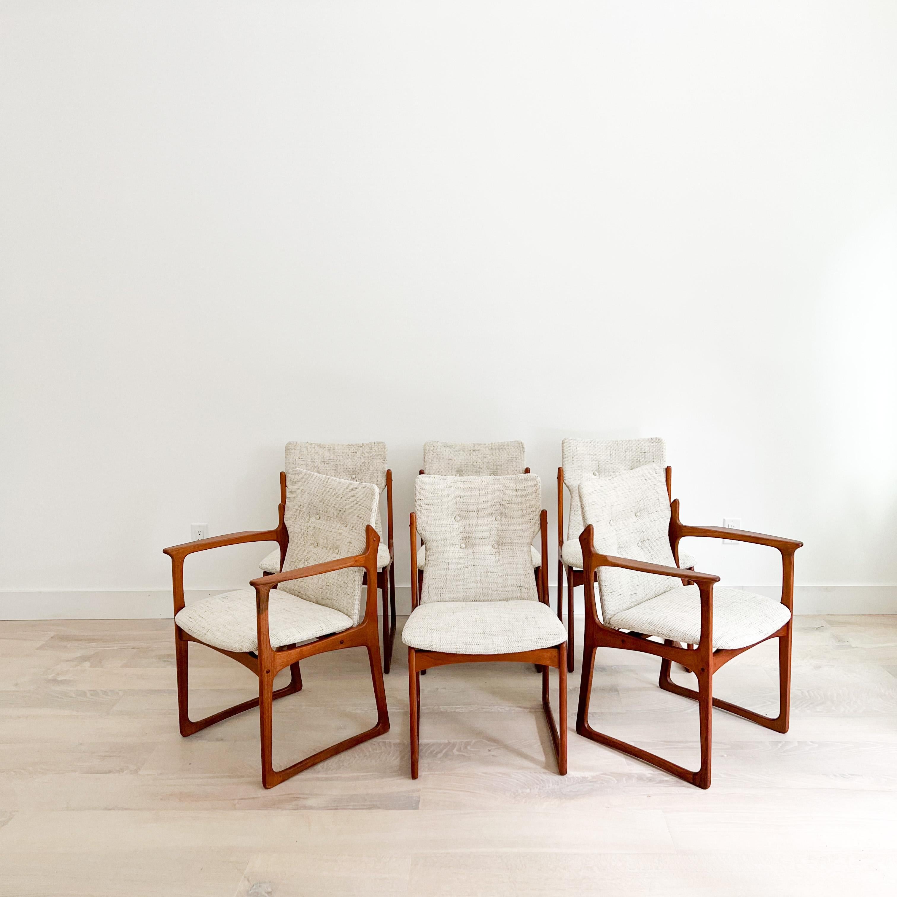 Set of 6 Mid-Century Modern teak dining chairs by Art Furn of Denmark. All new white tweed upholstery with stripes of black and grey. Some light scuffing/scratching to the teak frames from age appropriate wear.