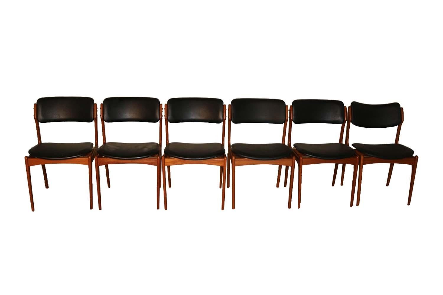 Six beautiful mid century model #49 teak dining chairs by Scandinavian designer Erik Buch for O.D. Mobler AS, circa 1960s. Buch’s organic and functional aesthetic are showcased in these beautifully crafted modern teak dining chairs. This rare set of
