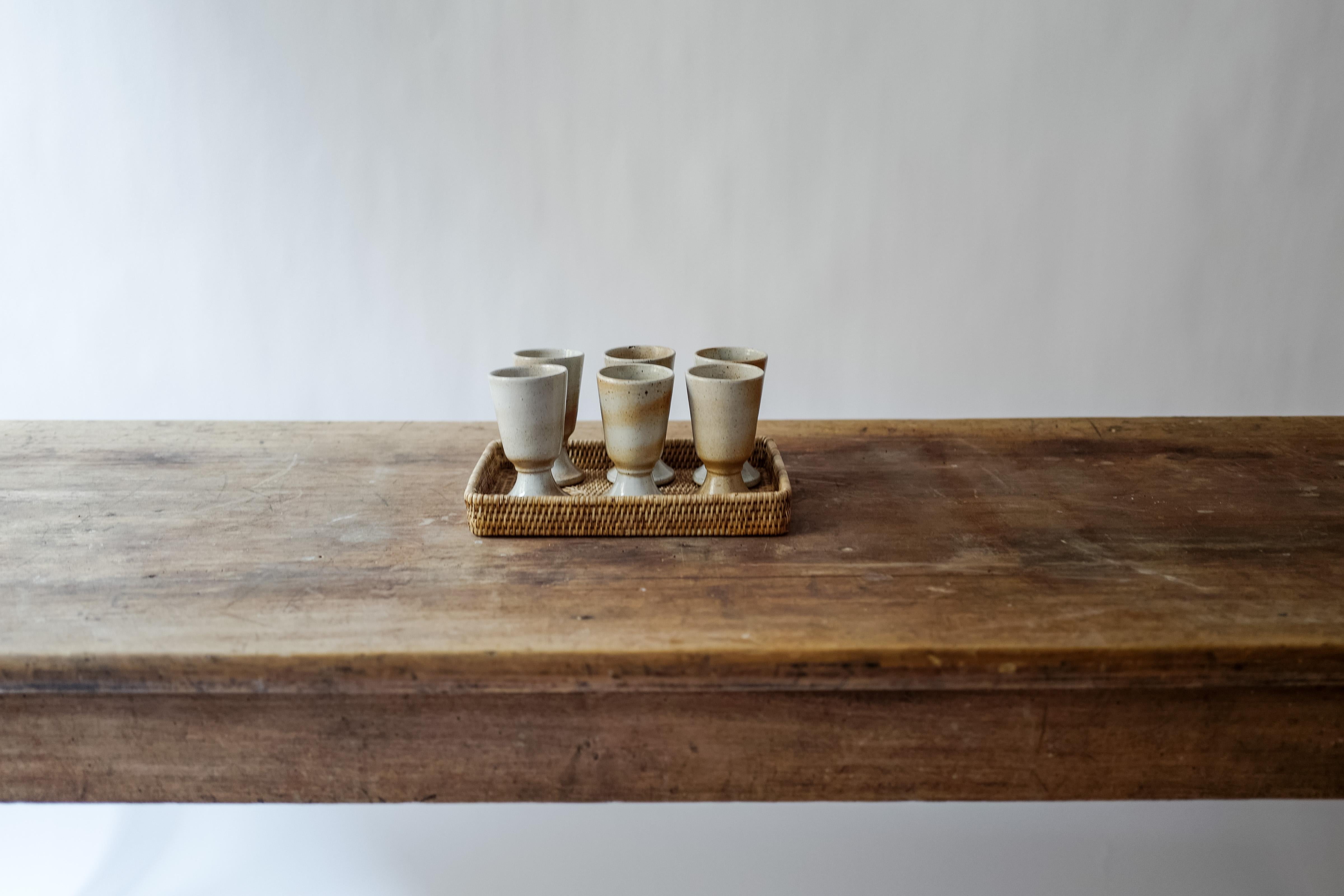 A set of 6 midcentury french Provincial earthenware tumblers.