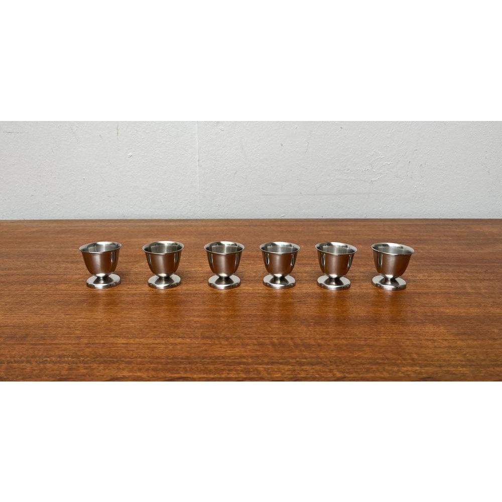 Mid-Century German Cromargan Egg Cups from WMF, 1960s, Set of 6, in Very Good conditions. Designed 1960 to 1969 This piece has an attribution mark.

Additional information:
Materials: Metal
Color: Silver
Styles: Mid-Century Modern
Country of Origin: