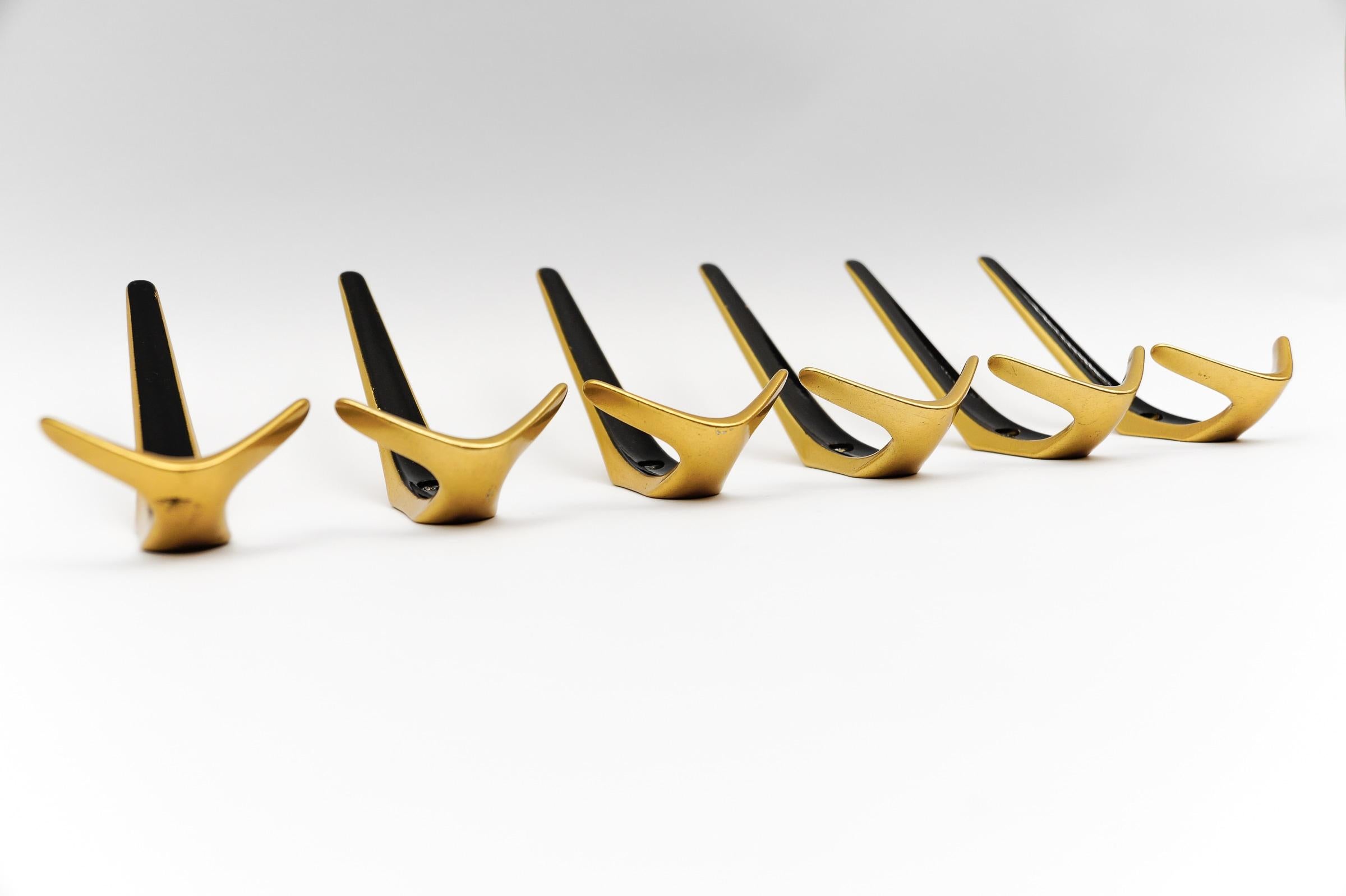 Austrian Set of 6 Mid-Century Modern Brass Wall Hooks, Austria, 1960s For Sale