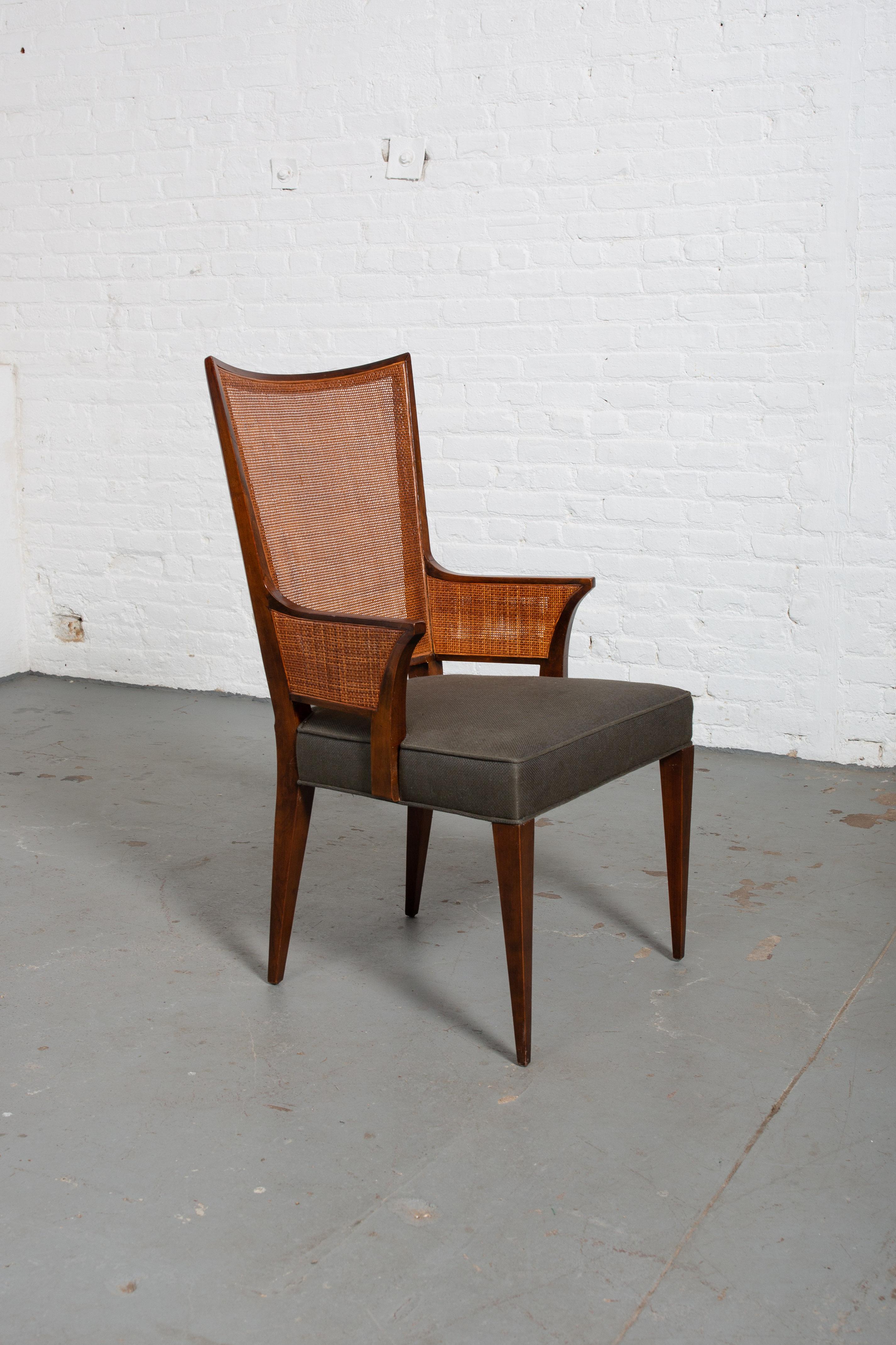 Set of 6 cane back dining chairs attributed to Harvey Probber with new upholstery and tapered legs. Very comfortable! Cane is in good condition. Chairs are in original condition with minor markings and scuffs to the wood.
Measures: Seat depth