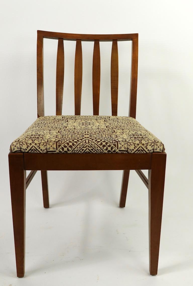 Stylish architectural set of dining chairs, of solid maple with upholstered seats consisting of 2 Armchairs, and 4 side chairs. Dimensions as follows:
Armchairs 32 Total H x 25 arm H x 17 seat H x 20 depth x 23 W
Side chairs 32 Total H x 17 seat H