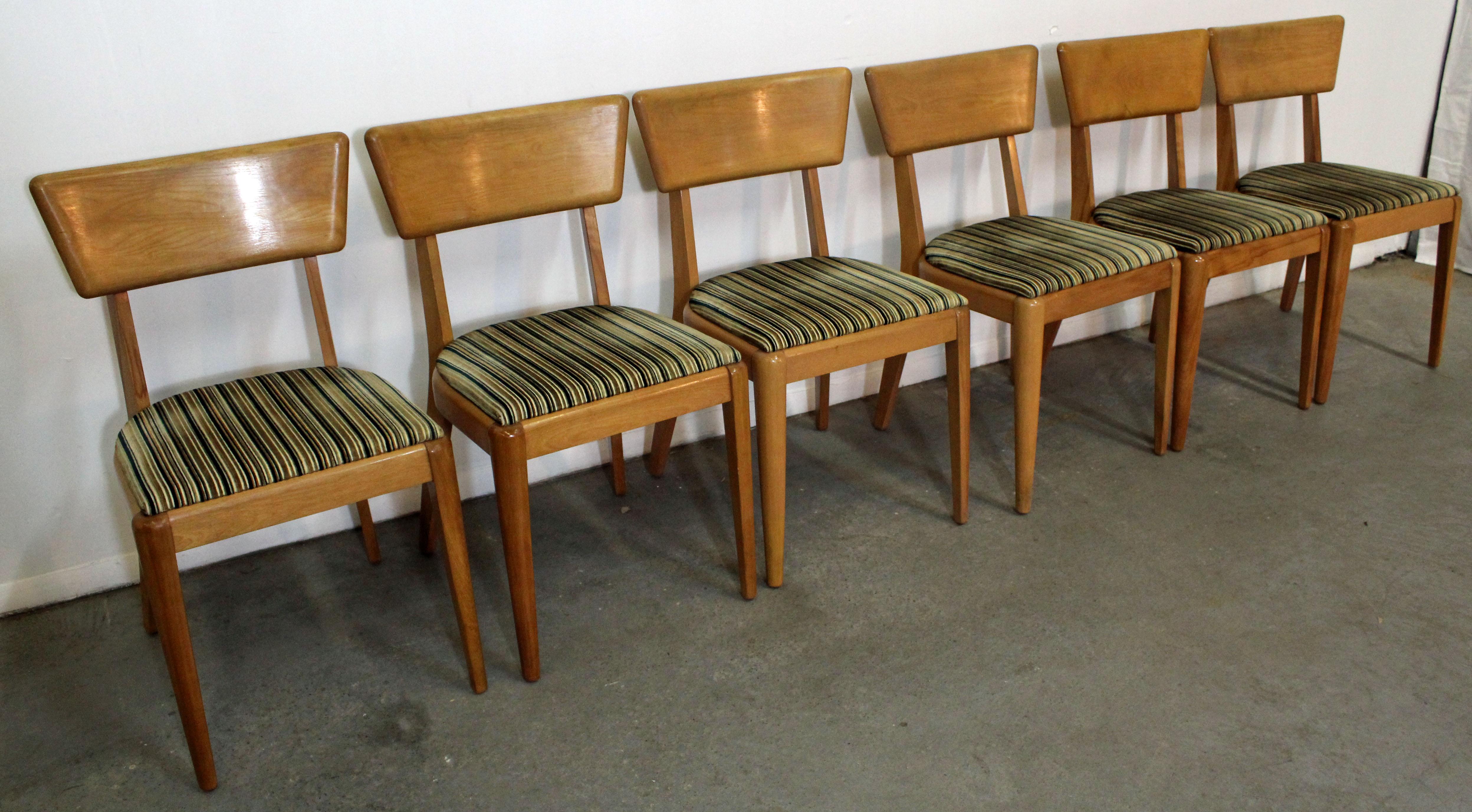 What a find. Offered is a set of 6 dining chairs by Heywood-Wakefield. This set is made of birch with a champagne finish. They are in good condition for their age, shows some wear. They are marked by Heywood-Wakefield.

Approximate