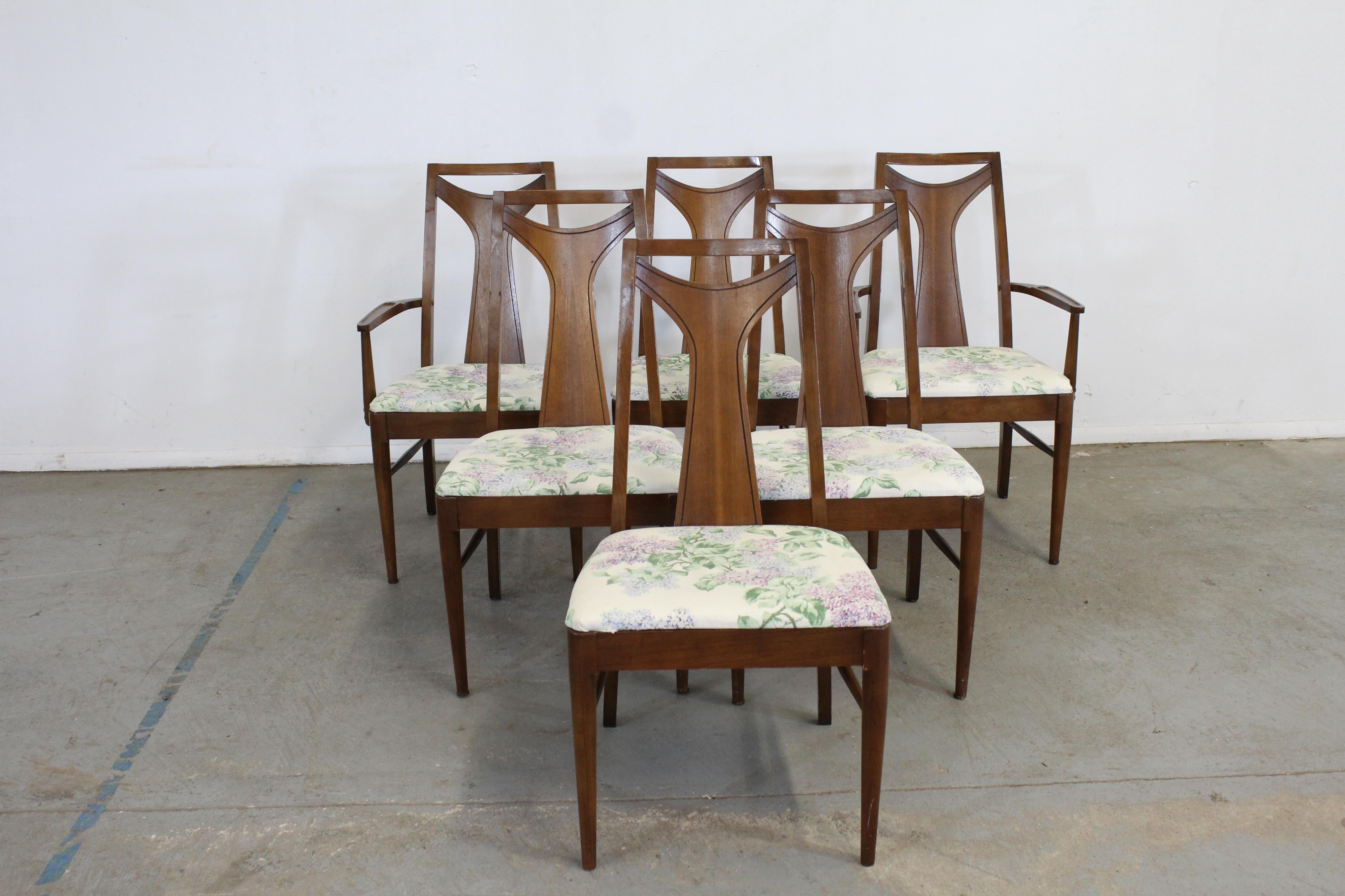 Set of 6 Mid-Century Modern Walnut kent Coffey dining chairs

Offered is a vintage set of 6 vintage dining chairs. They are in good structural condition but should be reupholstered. Shows surface scratches, age wear. They're not signed. Still a
