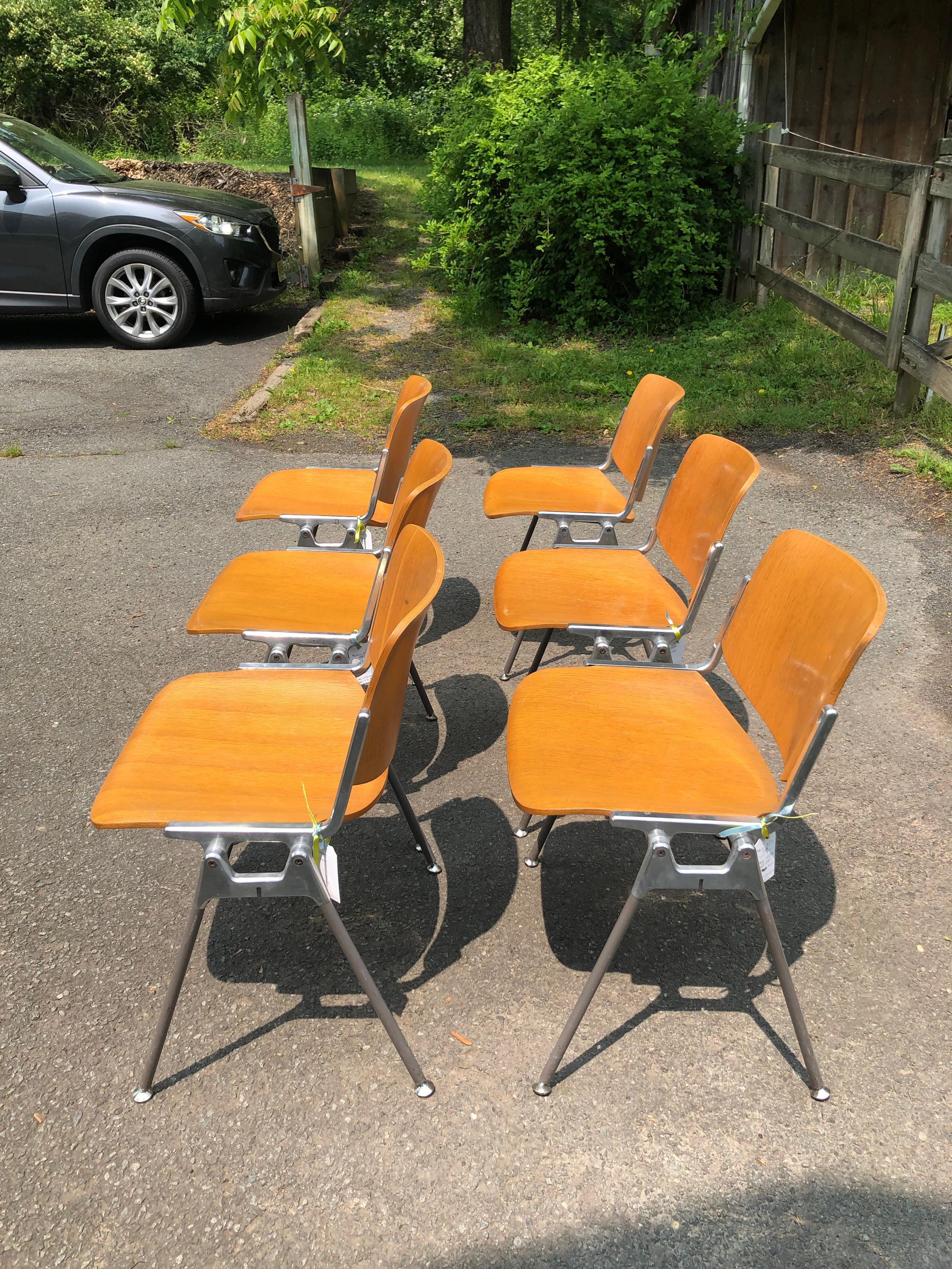 Fabulous set of 6 Italian plywood and steel industrial style schoolhouse chairs having authentic character and just the right amount of wear. Well constructed solid and heavy; can withstand a beating!
seat depth 17.5.