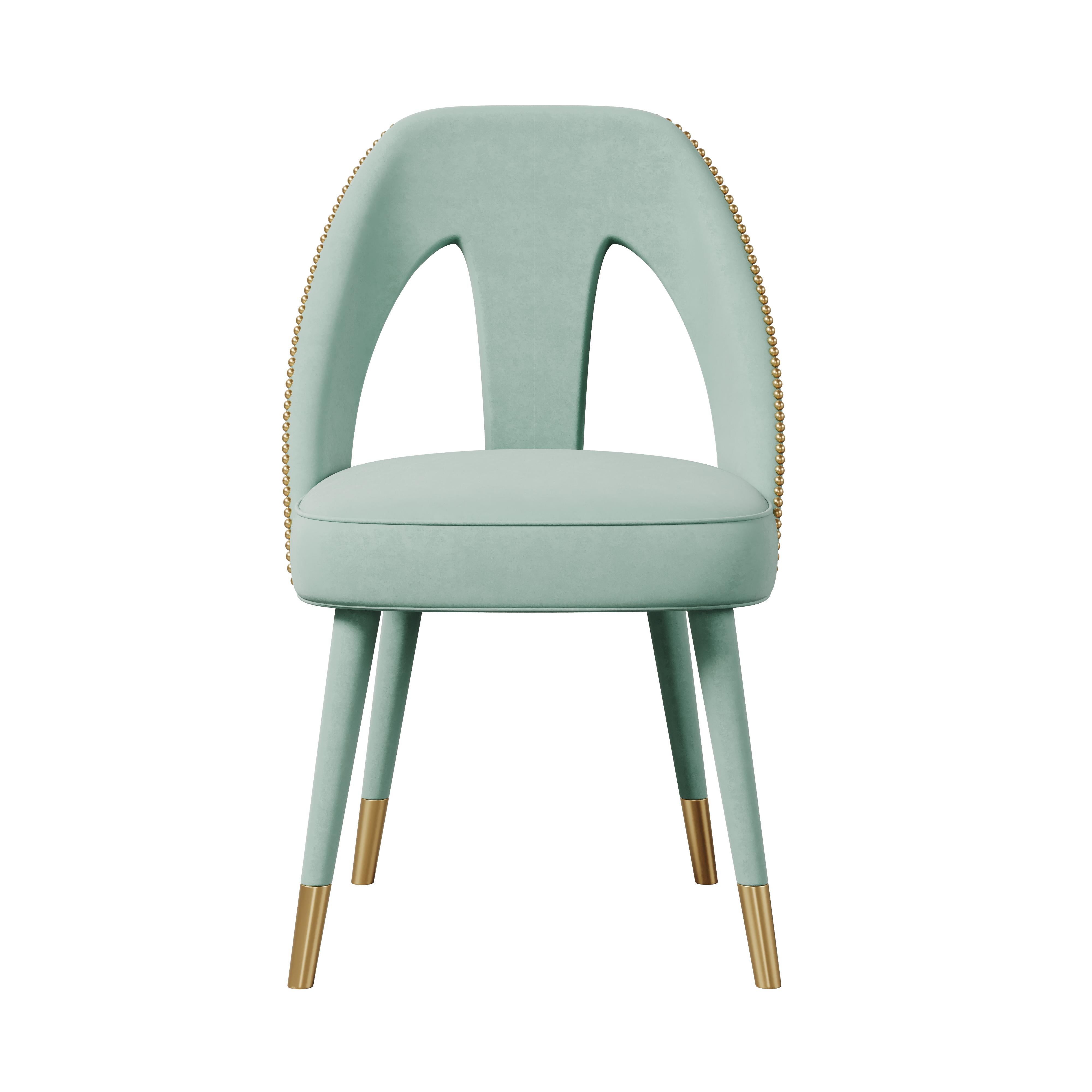 Inspirée par Paris, la charmante capitale des amoureux, la chaise de salle à manger Caron Mid-Century Modern affiche un design fascinant et romantique. Tout espace de vie contemporain deviendra un nid à passion où la séduction et l'amour vivent une