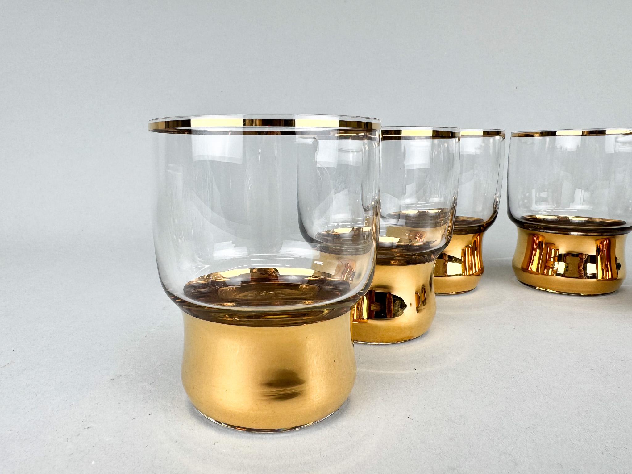 Set of six small richly gilded glasses from former Czechoslovakia made in the 1950's. Original Bohemian glass.