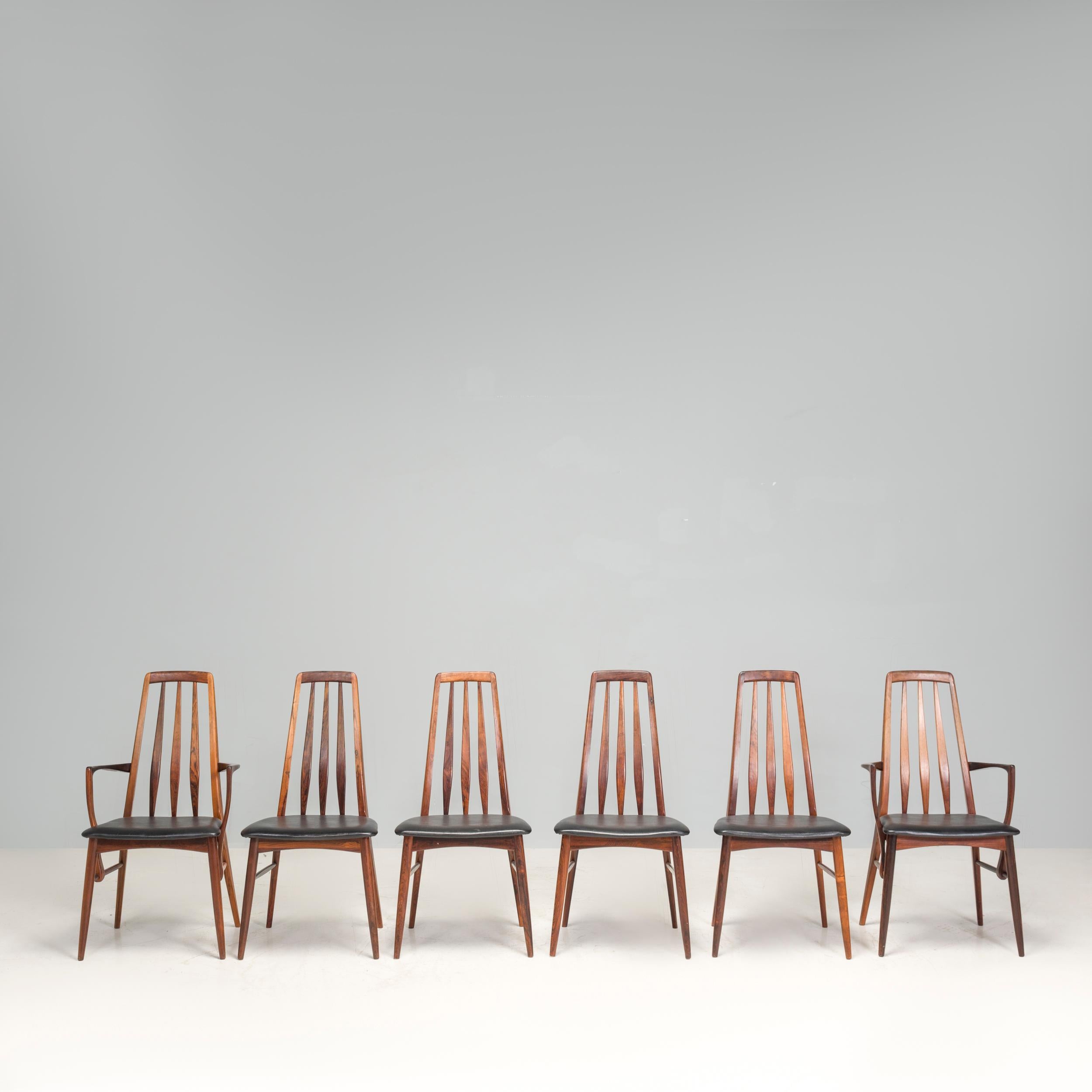 Set of 6 mid-century Danish dining chairs, including 2 carver chairs by Niels Koefoed.  

The four regular dining chairs, with tapering high backs, are visually set against the carving chairs with their curved armrests. The leatherette seat pads