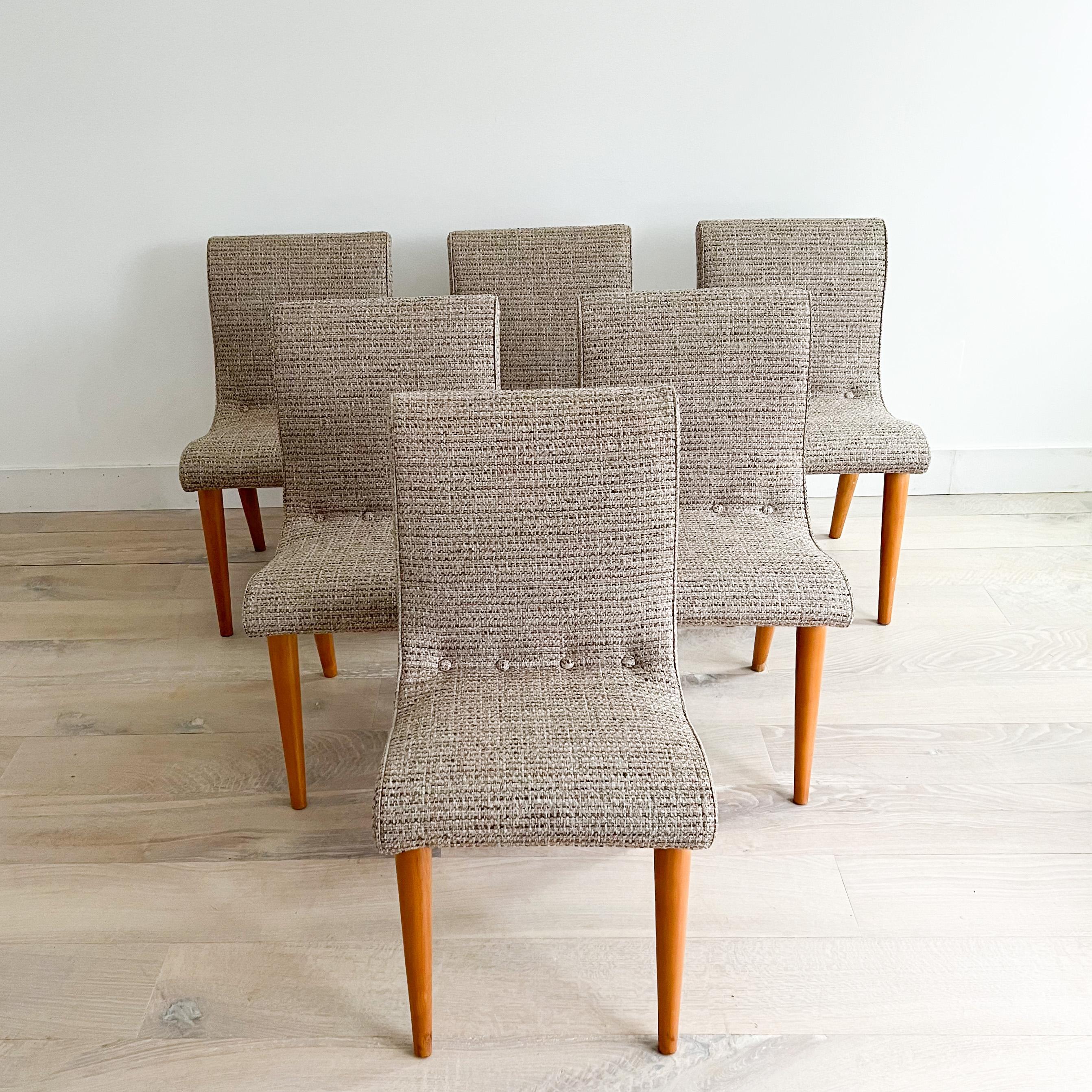 Set of 6 Mid-Century Modern birch dining chairs designed by Russel Wright for Conant Ball. New beige/brown tweed upholstery.