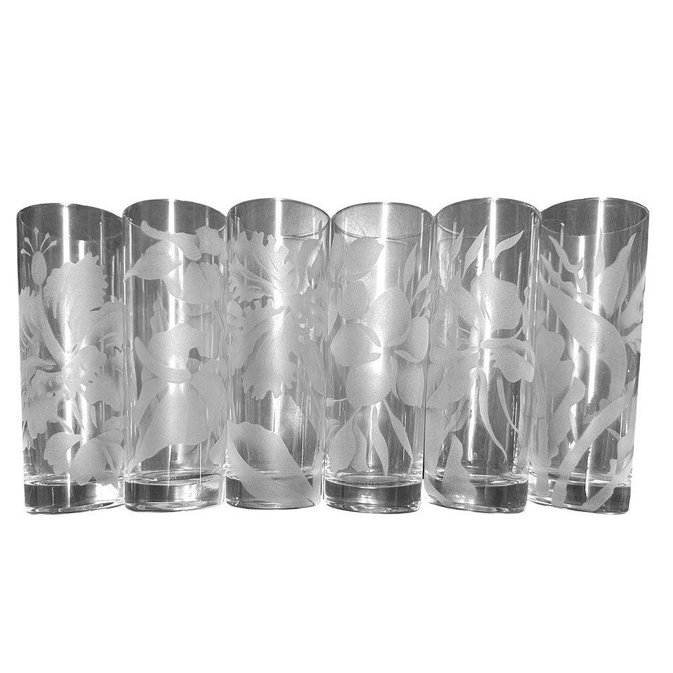 The Set of Six Mid-century Sandblasted etched Botanical Barware Tom Collins Glasses in the style of Dorothy Thorpe feature detailed sandblasted etchings of tropical flowers, including the vibrant hibiscus, exotic bird of paradise, dramatic