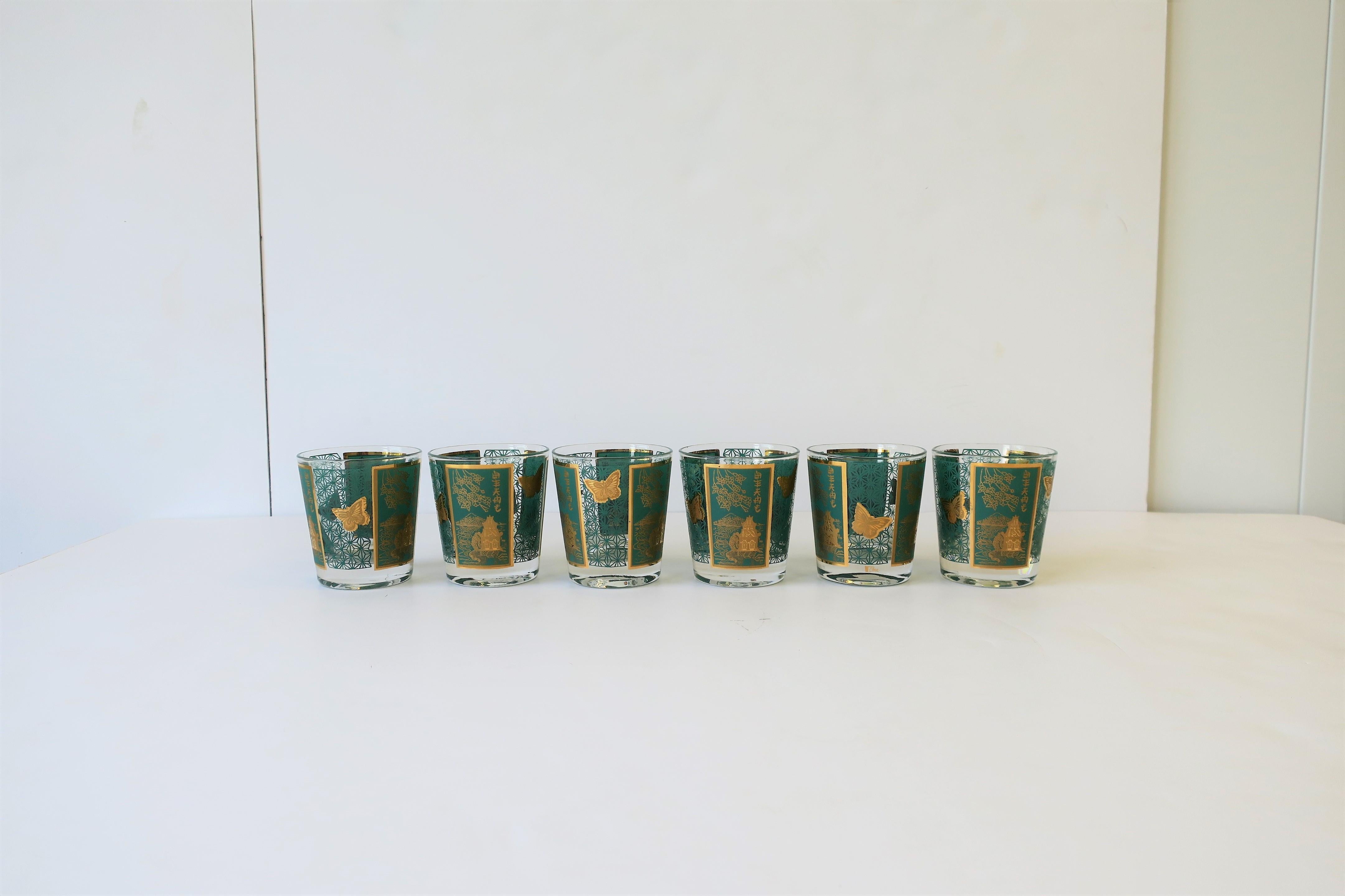 A beautiful set of six (6) mid-20th century gold and turquoise blue cocktail rocks' glasses with a chinoiserie design. A great set for any bar, bar cart or entertaining area. Each glass measures: 3.5
