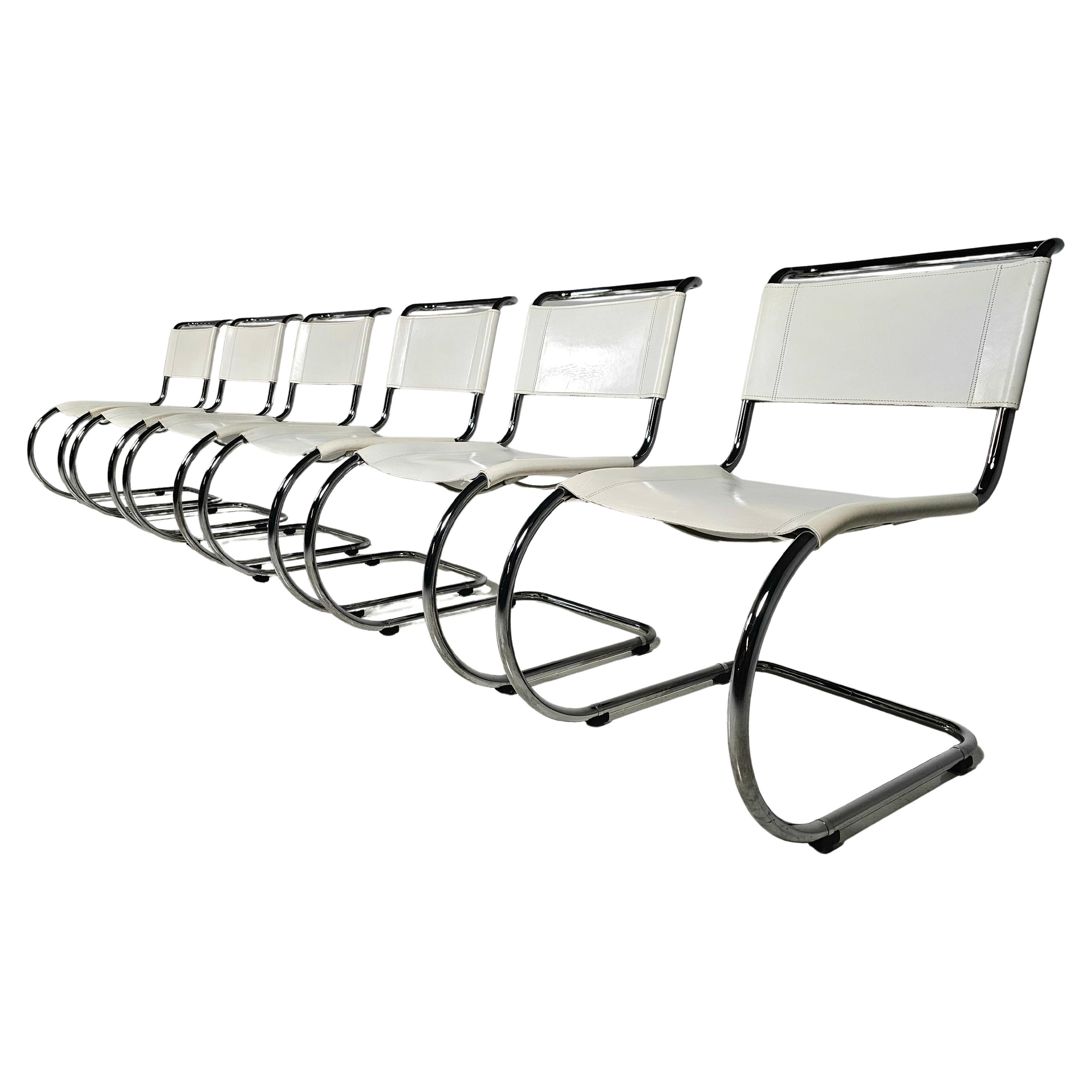 An iconic set of 6 MR10 (256CS/MR533) cantilever dining chairs designed by Mies van der Rohe and manufactured by Thonet. Chrome-plated tubular steel frames with white saddle leather seats

Inspired by Marcel Breuer's chairs, Mies van der Rohe